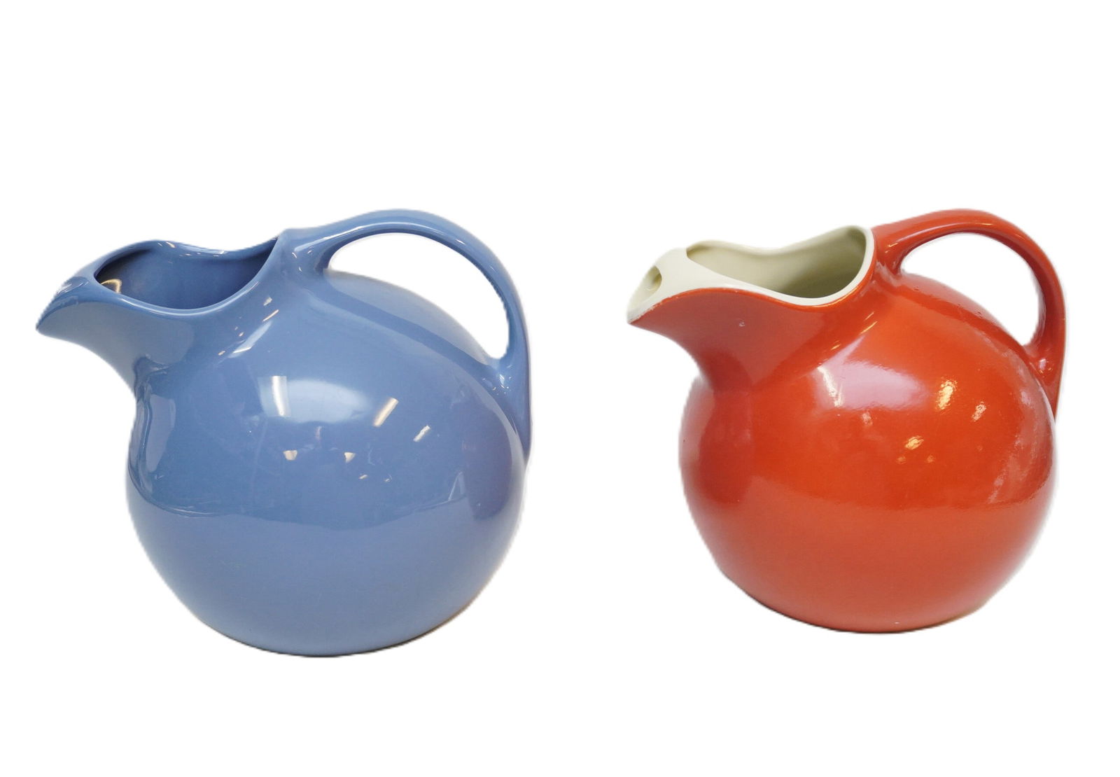 PAIR OF RED AND BLUE HALL POTTERY PITCHERS (1 of 4)