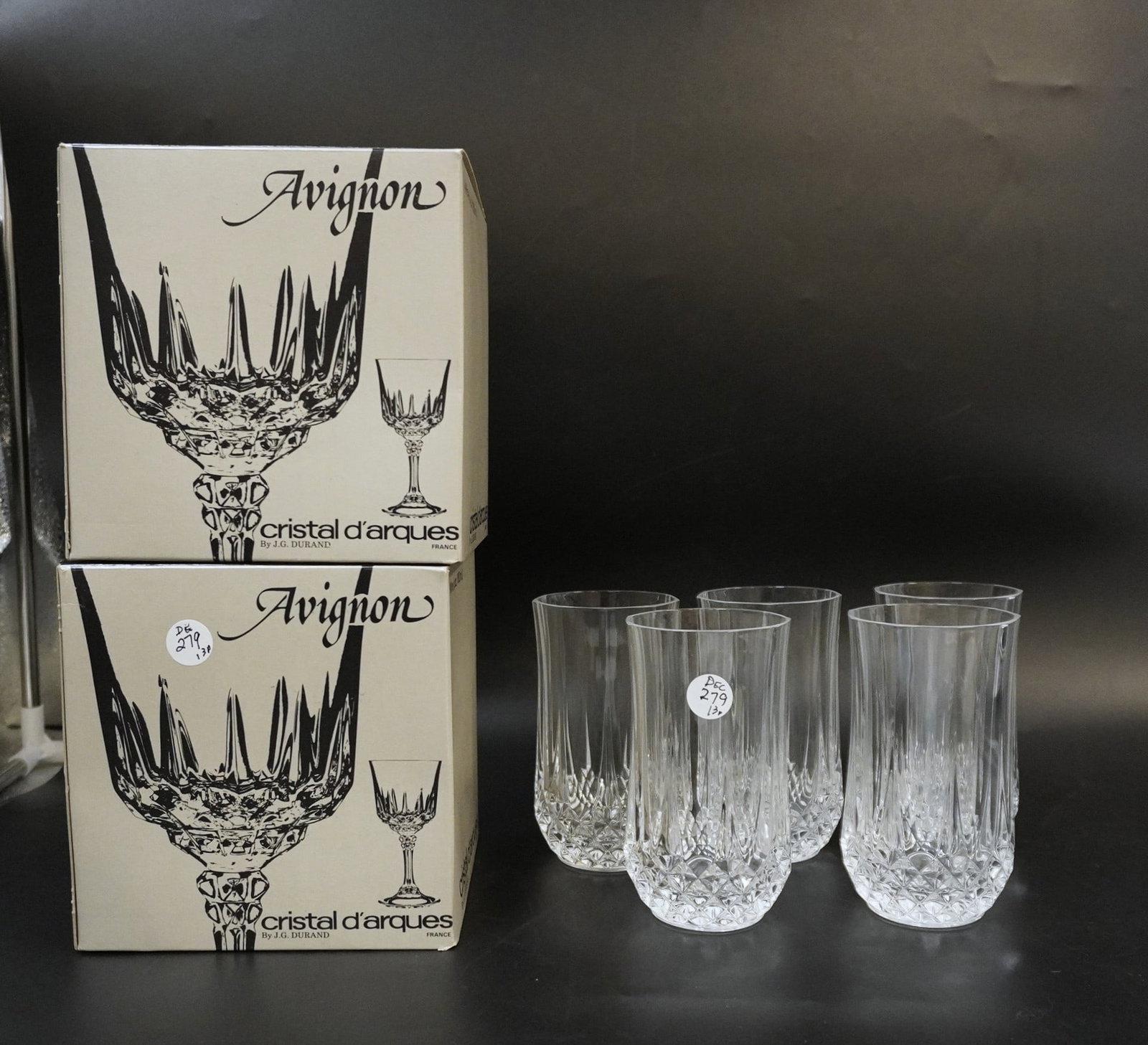 13 pc CRISTAL D'ARQUES TUMBLERS & WINE GLASSES: 5 Tumblers 5 3/8" in the Longchamps pattern and 8 Wine Glasses still in boxes in the Avignon Pattern each t6 1/4". Weight on all combined 9 lbs **In house shipping available on this lot**