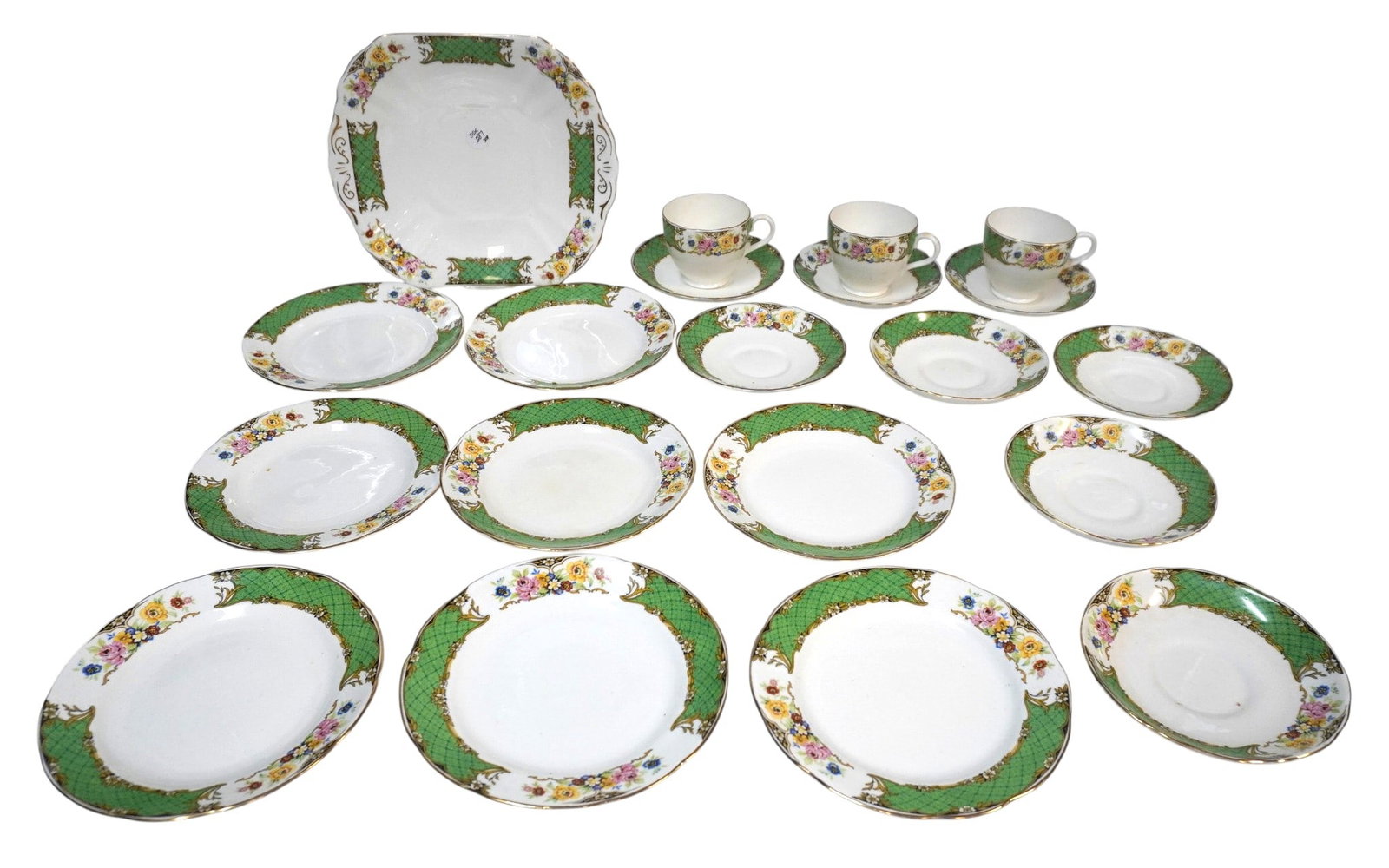 1940s RADFORDS ENGLISH CROWN CHINA: 8 Dessert Plates, 1 Dessert /Cake Plate, 8 Saucers, 3 Teas cups.Weight 8 lbs 10 oz. **In house shipping available on this lot**