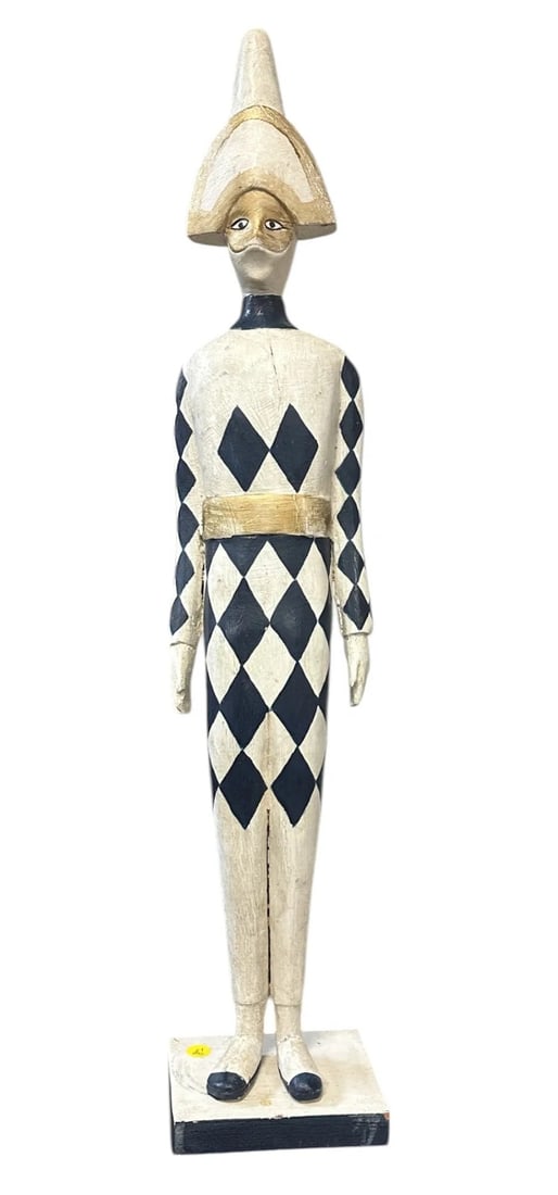 MID CENTURY FLORENTINE ITALIAN HARLEQUIN: Vintage 1970s hand carved Florentine standing harlequin figure. Navy and white checkered outfit and hand applied gold gilding, this is a great statement piece. Measures 5"x5"x30 1/2". Weight 5 pds.