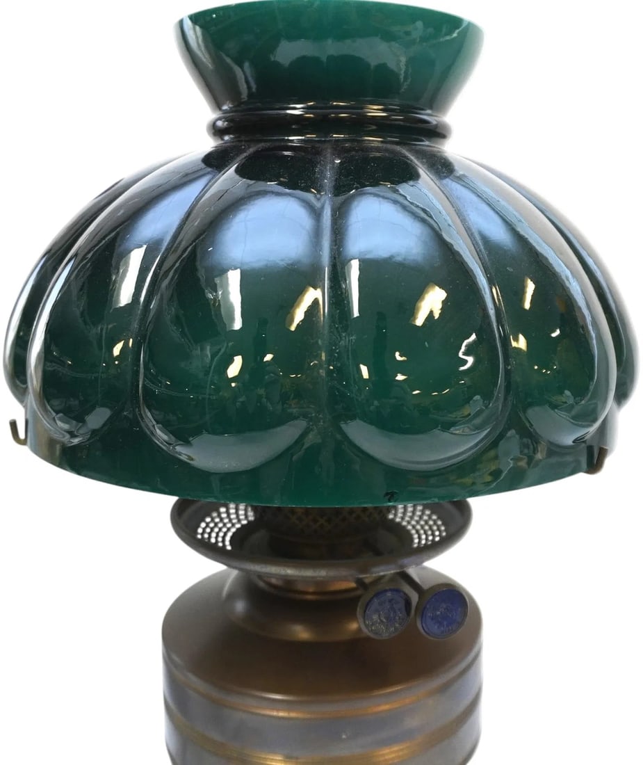ANTIQUE BRASS DITMAR VIENNA OIL LAMP W GREEN GLASS SHADE: Antique Brass Ditmar Vienna Oil Lamp Electrified with Green Glass Shade. Just Lamp 5.5"x5.5"x15". Shade 9.5"x9.5"x8". No glass chimney. Weight 7 lbs. PROVENANCE: The estate of noted Charleston Attorne