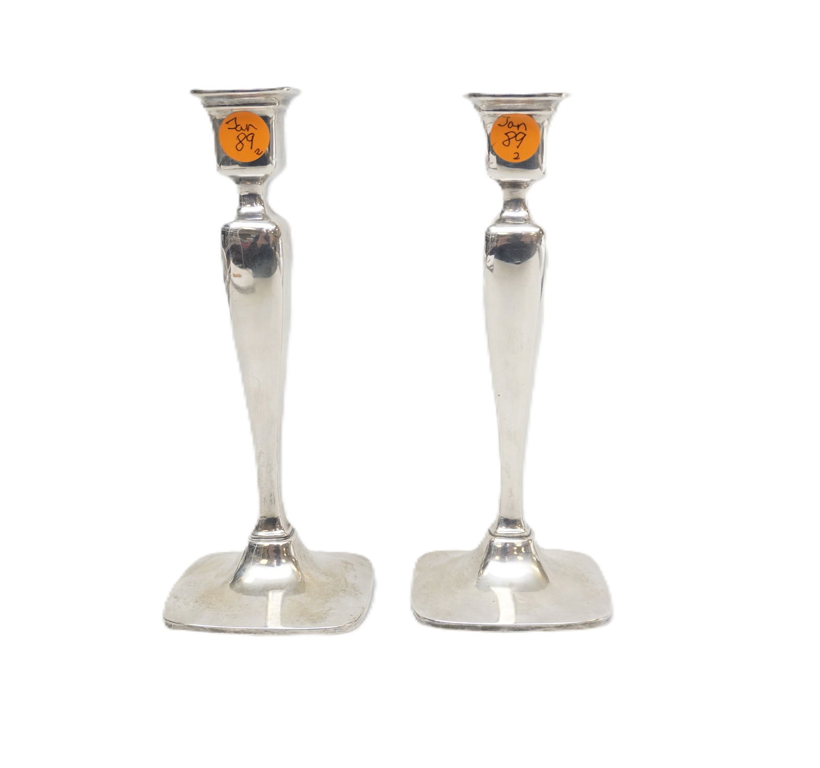 WALLACE STERLING SILVER ART DECO CANDLESTICKS: Pair of Art Deco Style Wallace Sterling Silver Candlesticks. Weighted. Measure 3 1/4"x3 1/4"x8 1/2". Weight 1 lb 3 oz. PROVENANCE: The Perrin family, of French Huguenot origin, of Abbeville, Perrin Pl