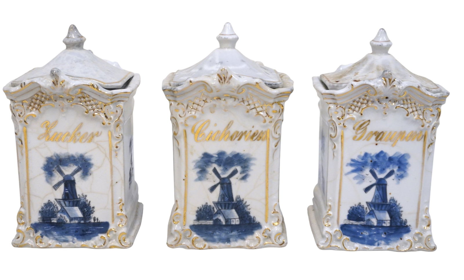 VINTAGE DELFT STYLE PORCELAIN KITCHEN CANISTERS - SET OF 3: Charming set of three vintage Delft style porcelain kitchen canisters. Perfect for shelf decor or countertop accent. Each measure approx. 7"x5"x5". Approx. combined weight 6 lbs. **In house shipping