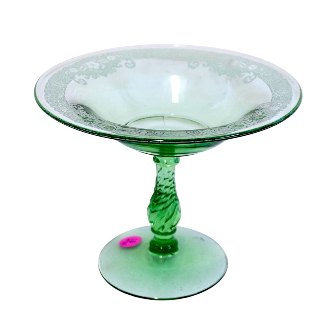 FOSTORIA ROYAL GREEN URANIUM FOOTED COMPOTE 1920-30S: Fostoria Royal Green Uranium Compote 2327, Etched Flowers , Swirl Stem. Measures 7 1/2"x7 1/2"x6". Weight 1 lb 3 oz.**In house shipping available on this lot** If you win this lot, please select self