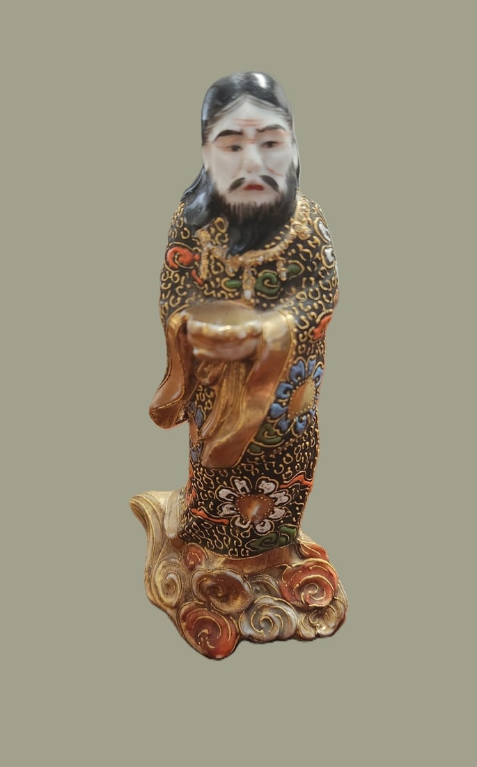 ANTIQUE JAPANESE KUTANI ENAMELED PORCELAIN: Antique 1920s Japanese Kutani Enameled Porcelain Wise Man with Gilt Accents. Measures 2 1/2"x2"x5 1/2" Weight 5 oz **In house shipping available on this lot** If you win this lot, please select self
