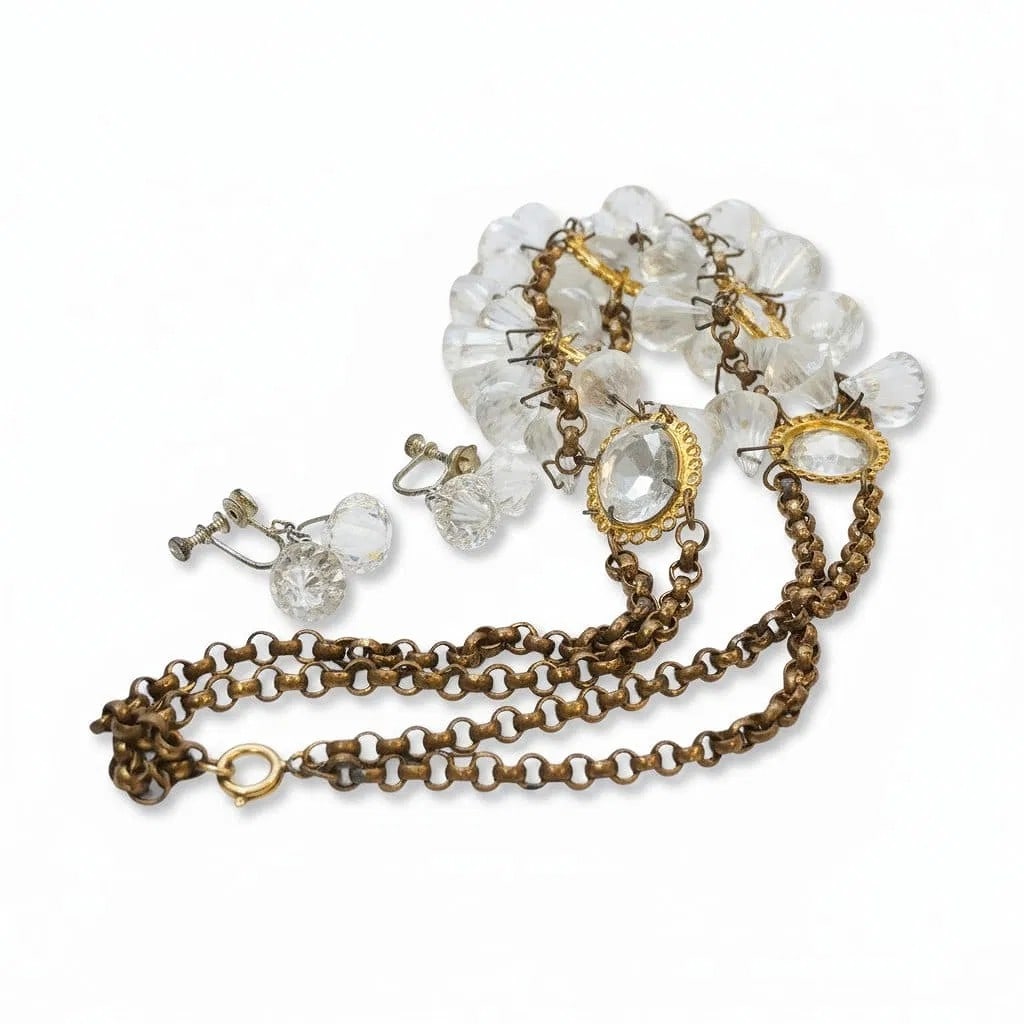 LARGE ART DECO CUT CRYSTAL DEMI PARURE: Large 1920-30s Cut Crystal Demi Parure Necklace 17 1/2" opened. Screw back earrings 1 1/4". Weight 4 oz. PROVENANCE:The Historic 1798 John Burckmeyer House, 120 Wentworth Street, Charleston SC **In