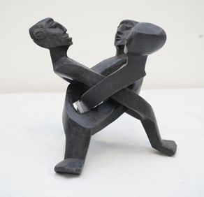 LARGE FIGURATIVE FOLDING WOODEN SCULPTURE