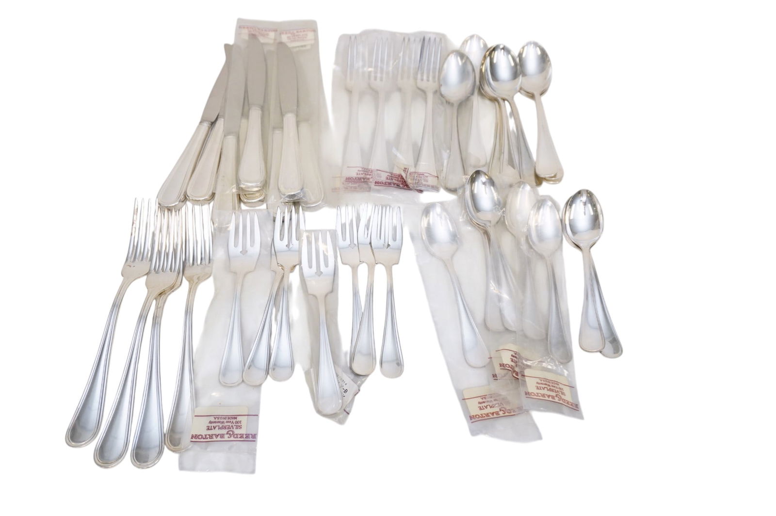 39 PC WAVERLY REED & BARTON FLATWARE: Many still unopened. 8 dinner knives. 8 dinner forks. 8 place oval soup spoons. 8 teaspoons. 7 salad forks. Weight on all 3 bs. PROVENANCE:60 Anson Street (The Historic Robert M. Venning House) **In