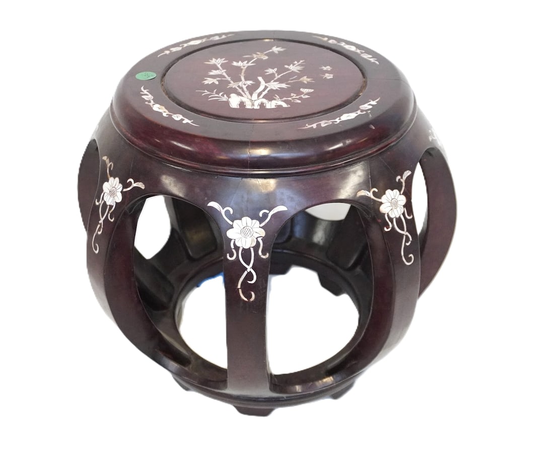 CHINESE ROSEWOOD MOTHER OF PEARL DRUM STOOL: Vintage Chinese Rosewood barrel shaped wood stool with intricate mother of pearl inlay. Measures approx. 13" in dia and 13.5" h and weighs 4 lbs 2.5 oz PROVENANCE:The Historic 1798 John Burckmeyer