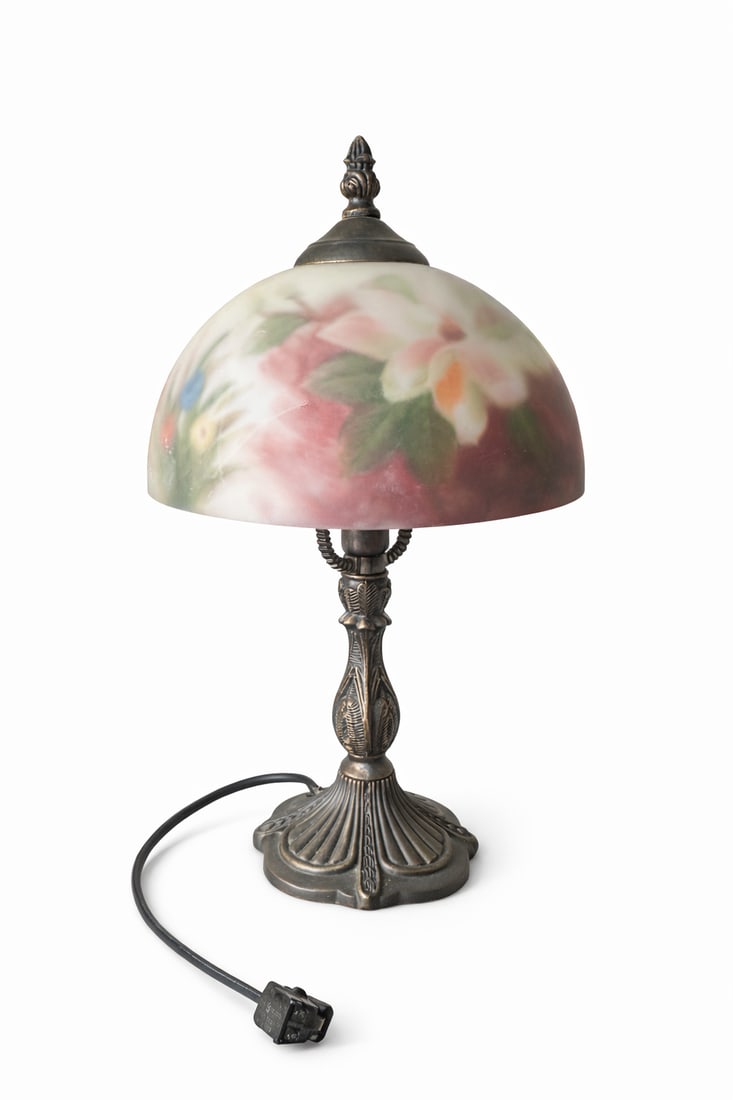 ART NOUVEAU STYLE PAINTED GLASS TABLE LAMP: Decorative style table lamp featuring a domed frosted glass hand painted shade mounted on an ornate cast metal base. Measures 14" x 8" x 8". Weighs approx. 3 lbs. ***In house shipping available on