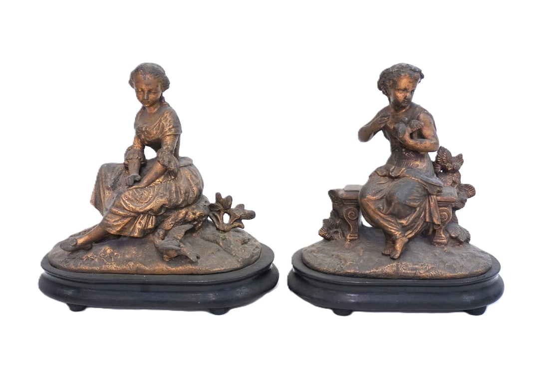 PAIR OF FRENCH 19TH C SPELTER SCULPTURES: Pair of 19th c French Spelter Petite Sculptures on wood bases. These pairs were often used as bookends. Each 9"x4"x9 1/4". Weight combined 3 lbs 8 oz. PROVENANCE:The Historic 1798 John Burckmeyer