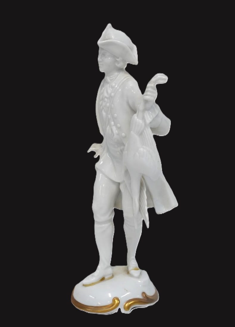 ANTIQUE ROSENTHAL PORCELAIN FALCONER: Rosenthal White Porcelain with gilt Falconer Figurine. Measures 4"x3"x8". Weight 9 oz. PROVENANCE:60 Anson Street (The Historic Robert M. Venning House) **In house shipping available on this lot** If