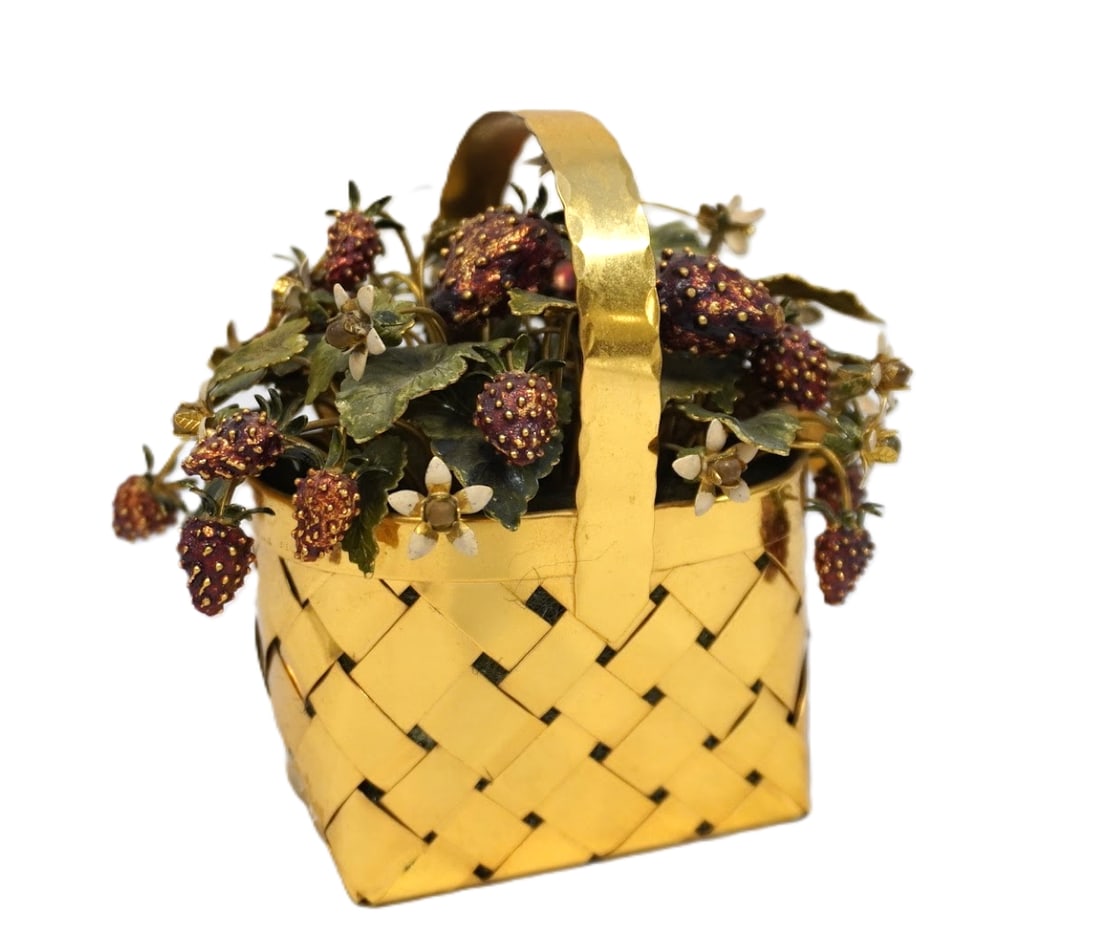 CARTIER STERLING SILVER STRAWBERRY BASKET: Cartier Mid Century sterling silver with gold vermeil basket. Retailed by Cartier in New York. Rectangular with straight sides. Plain rim and fixed c-scroll handle with ?stitched? rims. Woven strips.