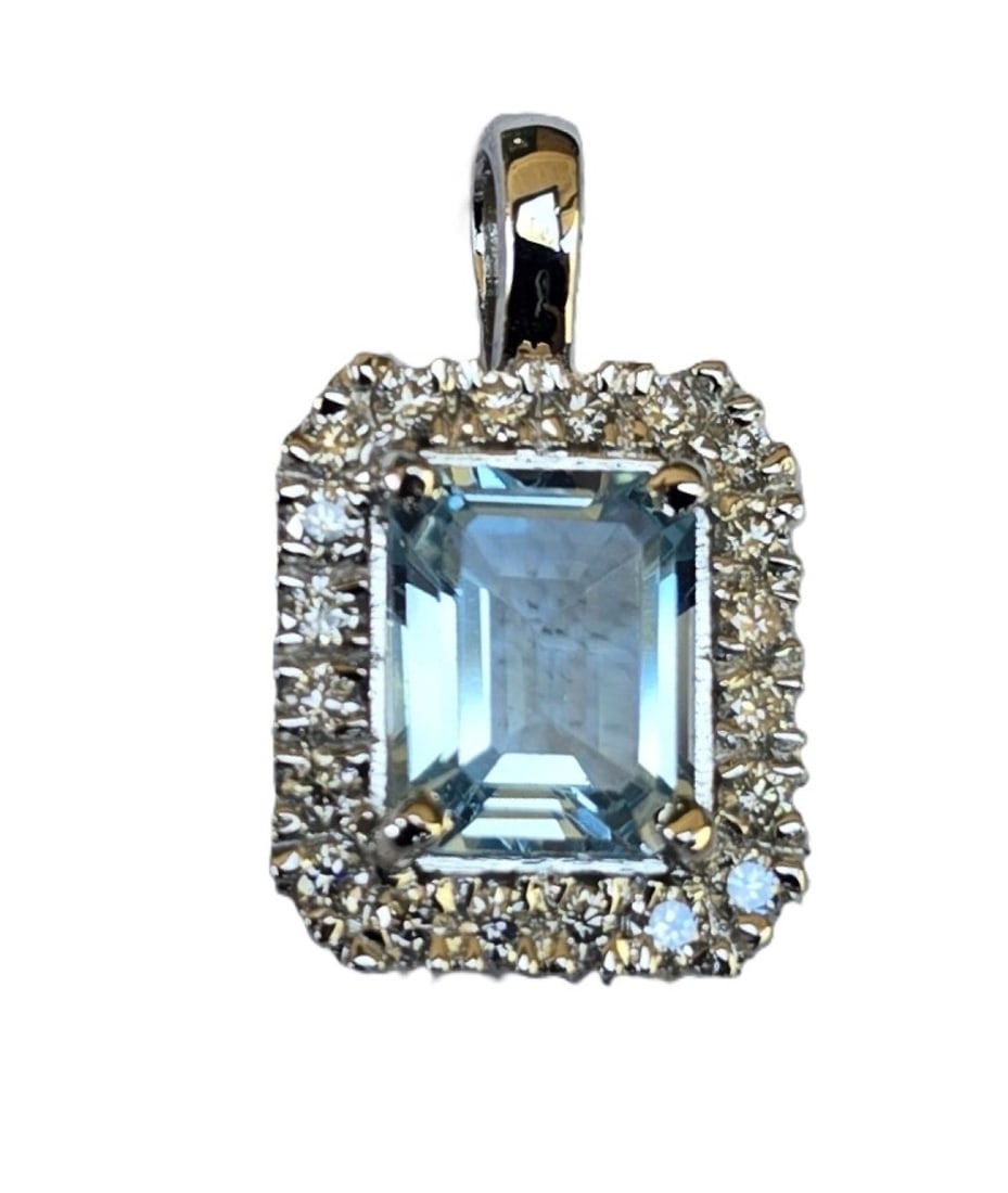 14k AQUAMARINE 4.50CT & DIAMOND PENDANT: Stunning Ladies Aquamarine and Diamond Pendant, The pendant is marked and tested as 14k white gold. The aquamarine is an emerald cut shape, set in four prongs, measuring approximately 11.00mm x 9.00mm