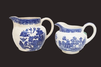 PAIR OF BLUE WILLOW TRANSFERWARE PITCHERS