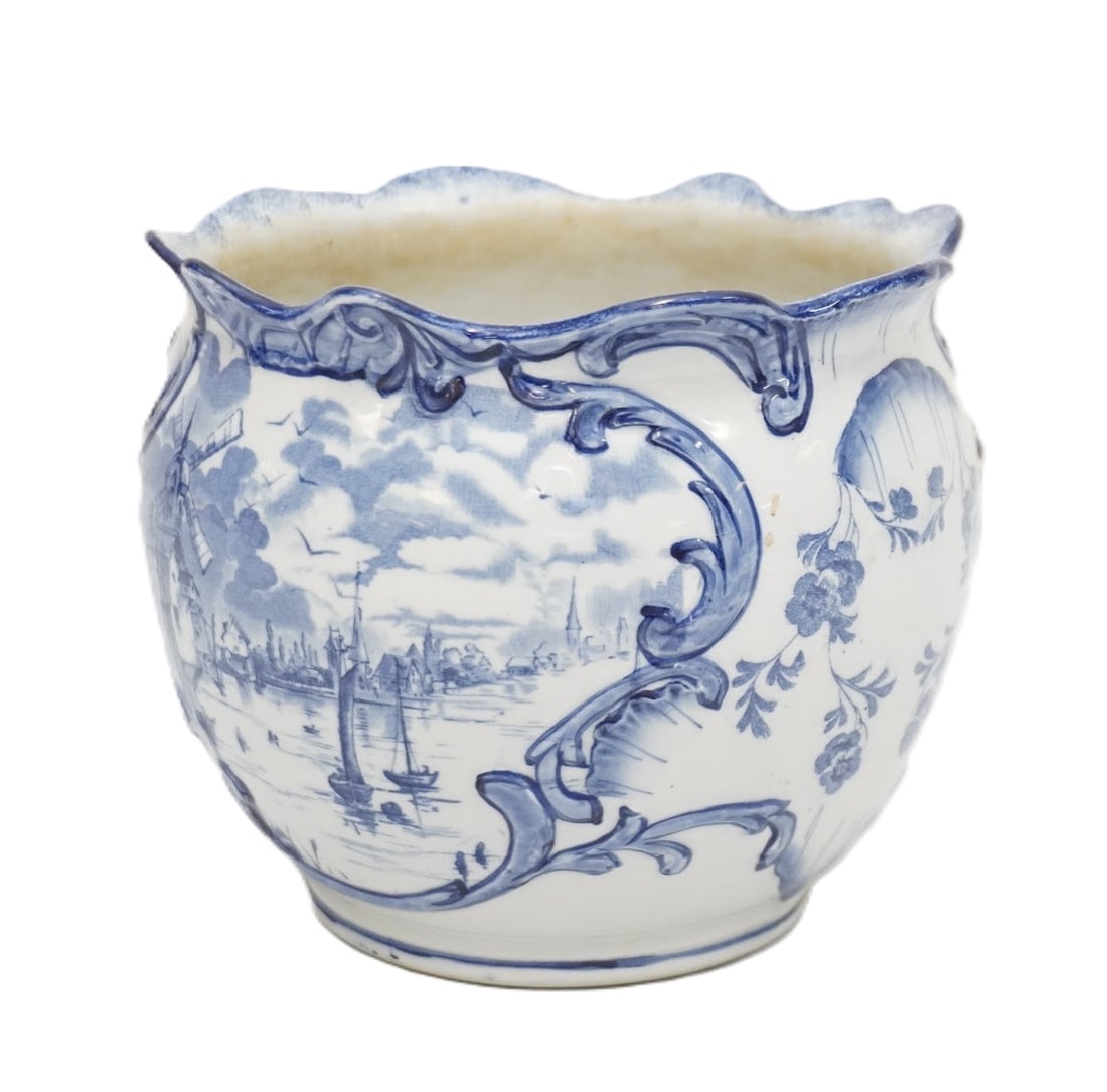 ANTIQUE EMPIRE WORKS STOKES ON TRENT FLOW BLUE JARDINIERE: Antique Empire Works Stokes on Trent Flow Blue Jardiniere circa early 1900s. Measures approx. 5.25" x 6" dia. and weighs 1 lb 5 oz. **In house shipping available on this lot** If you win this lot, ple
