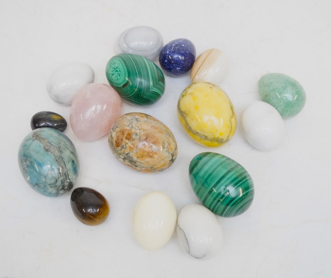 16 MARBLE AND STONE CARVED EGGS: 16 Marble and Stone Carved Eggs in Various Sizes/Materials. Largest measures approx. 2.5" and total lot weight is 3 lbs 10 oz. **In house shipping available on this lot** If you win this lot, please