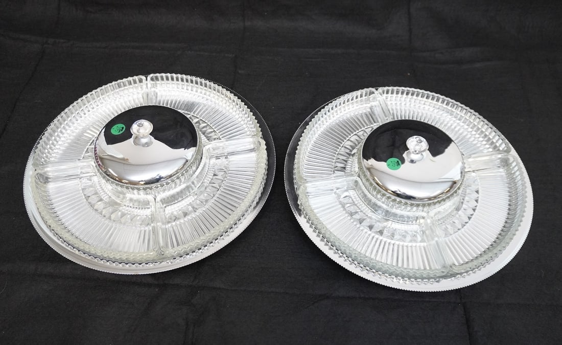PAIR OF MCM KROMEX LAZY SUSAN SERVING PLATTERS: Pair of MCM Kromex Lazy Susan Serving Platters. Glass is fully removable and lazy susans still work great. Comes with full set of replacement glass and extra lid. Each measures about 14" in dia.