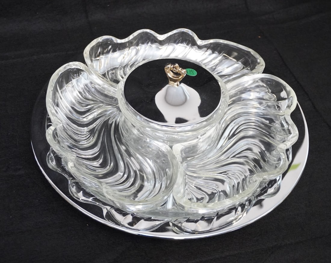 LARGE MCM KROMEX LAZY SUSAN: Large MCM Kromex Lazy Susan. With removable glass pieces. Measures approx. 16" in dia and weighs 9 lbs. **In house shipping available on this lot** If you win this lot, please select self arranged