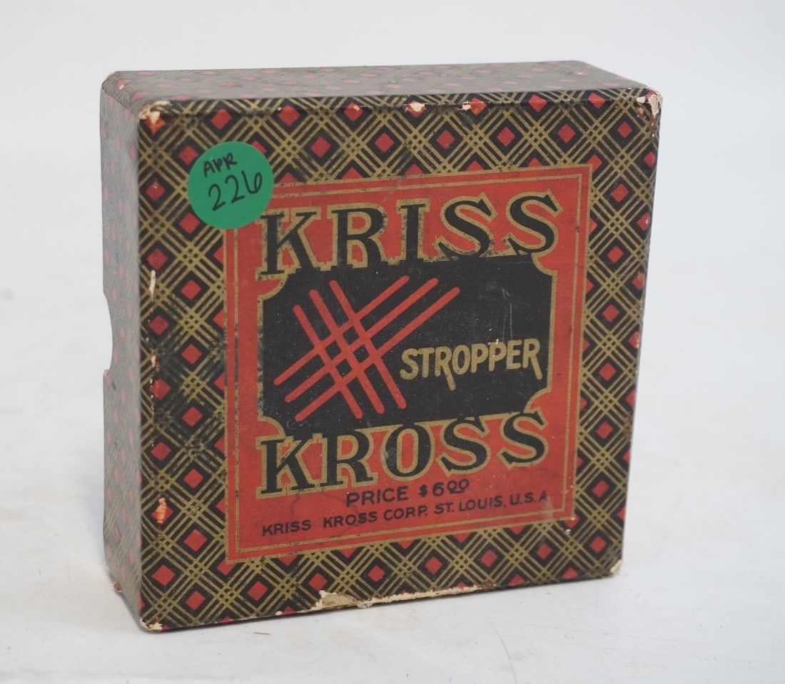 KRISS KROSS STROPPER BLADE SHARPENER: The Vintage Chrome Kriss Kross Stropper Razor Blade Sharpener is a compact 4" tool made in the United States. It comes in its original box with instructions. Box measures approx. 5" x 5" x 2" and