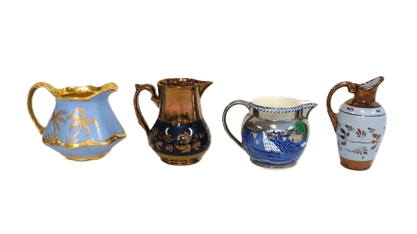 4 ANTIQUE / VINTAGE LUSTERWARE CREAMERS: 4 Antique / Vintage Lusterware Creamers. Includes Wedgwood Fallow Deer. Largest 5 1/2"x4". Weight on all 2 lbs 3 oz. PROVENANCE:The Historic 1798 John Burckmeyer House, 120 Wentworth Street,
