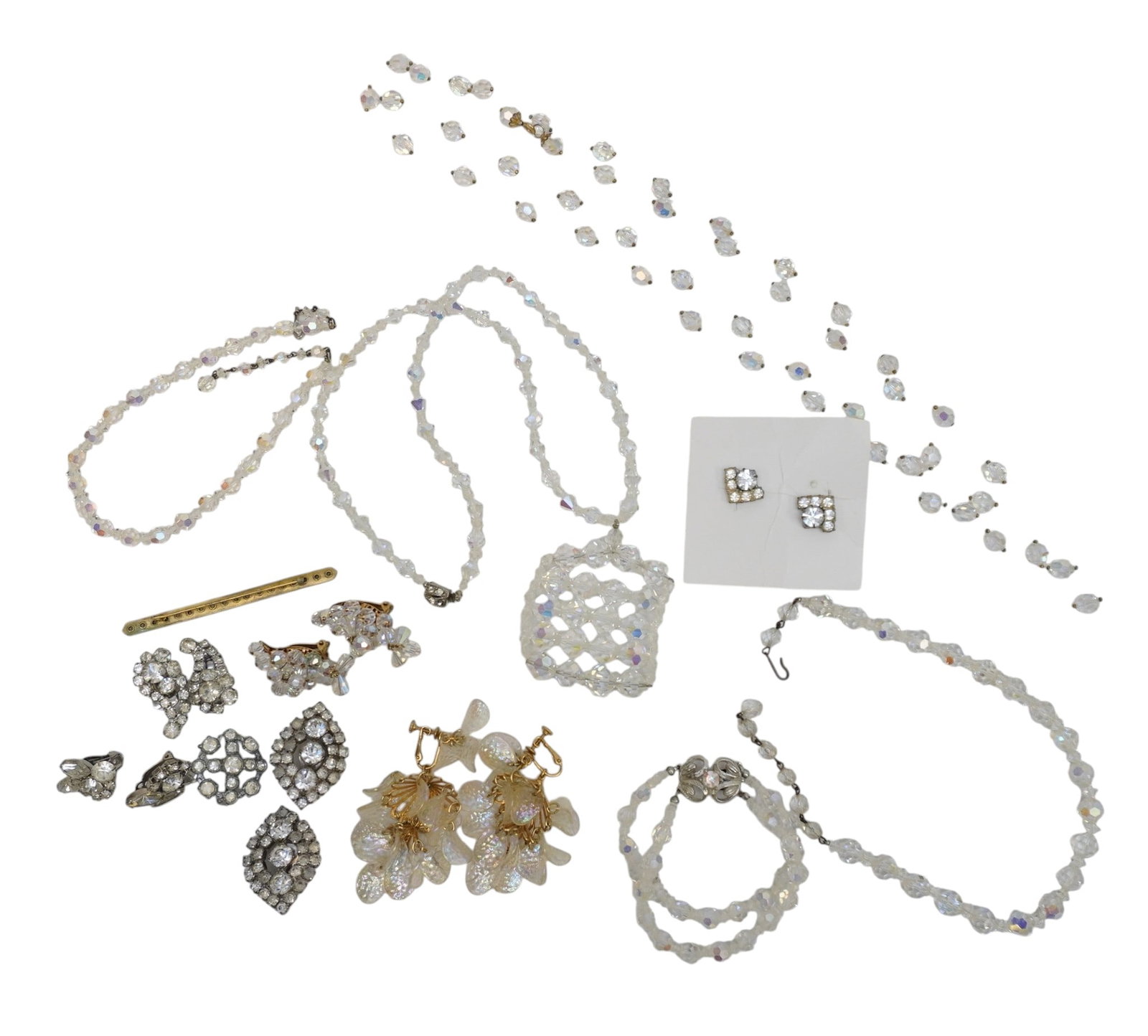 LOT OF VINTAGE 1950-70 CRYSTAL & RHINESTONE JEWELRY: All are Vintage 1950-1970. 6 Pair of Earrings, 1 Screwback, 5 Clip on, including a fabulous pair of 3" Napier Chandelier Earrings. 4 Necklaces including a very long (60" when opened) strand of crystal