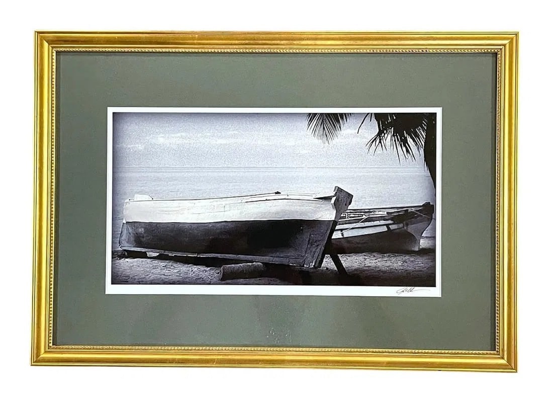 FRAMED PHOTOGRAPH FISHING SKIFFS SIGNED: Signed Photograph Fishing Skiffs, Signed. Professionally framed, Mmasures 17.75" x 25.5" and weighs 5 lbs 8 oz. **In house shipping available on this lot** If you win this lot, please select self