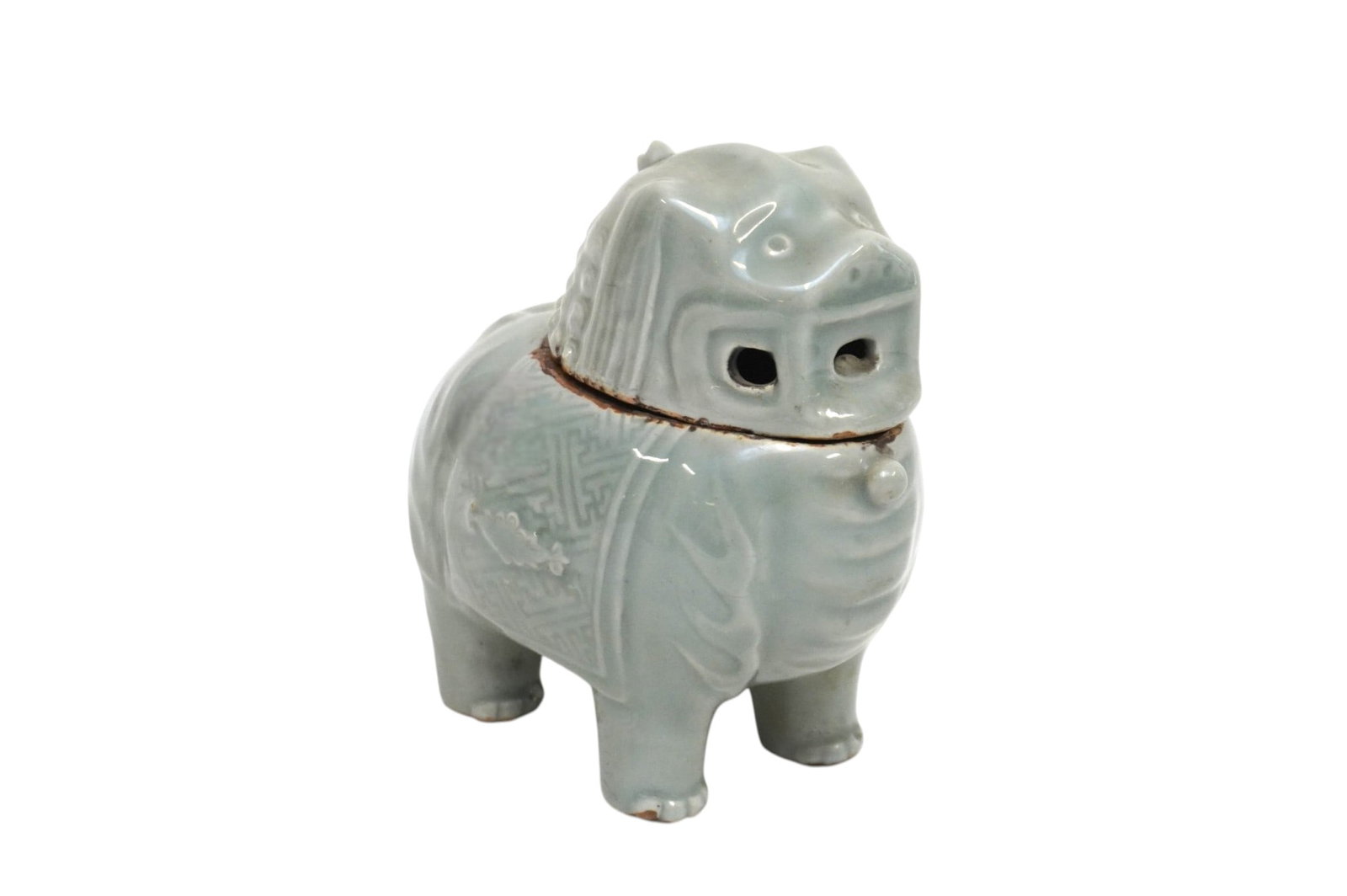 LONQUAN CELADON QILIN CENSER WITH LID: Longquan yao Celadon Glazed Kylin (Qilin) shaped Censer. Measures 6"x3 1/2"x6 1/2". Weight 3 lbs. PROVENANCE The Historic R.M. Venning House, Charleston SC **In house shipping available on this lot**