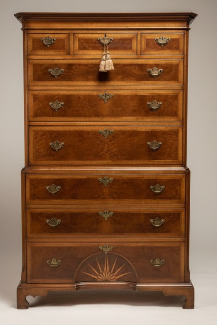 ANTIQUE GEORGIAN BURL WALNUT TALL BOY CHEST: Antique Georgian Burl Walnut and Cross Banded Tall Boy Chest with Concave Inlaid Sunburst. Molded cornice above 3 short drawers and 3 long graduated drawers above 3 lower long drawers, lall ocking,
