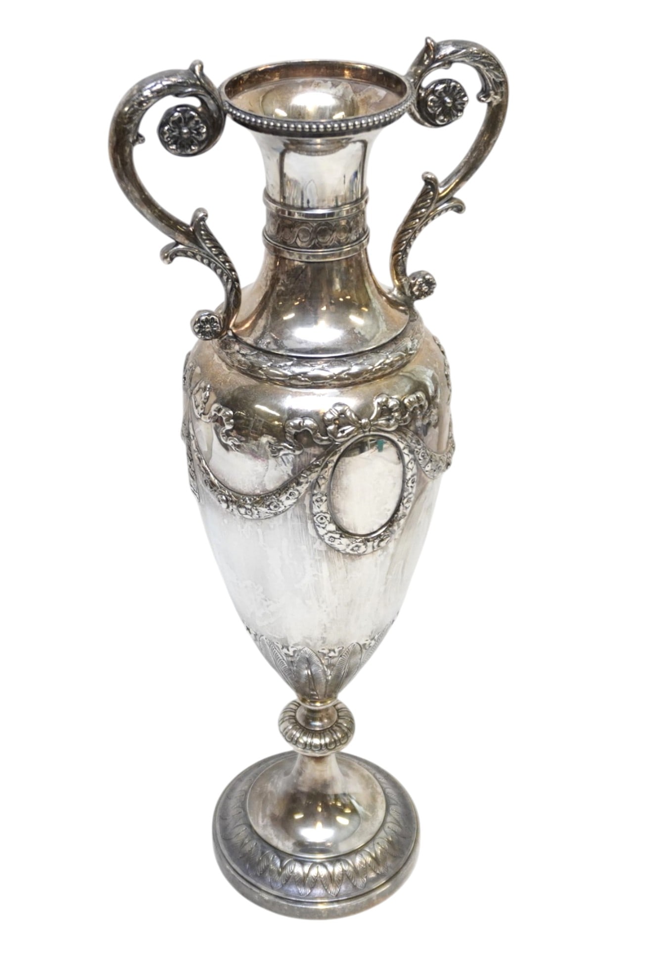 LARGE NEOCLASSICAL SILVER PLATE URN: Large Neoclassical Silver Plate Urn. Acanthus Leaves at base with Tulips. Measures 8"x6"x20" tall. Weight 4 lbs **In house shipping available on this lot** If you win this lot, please select self