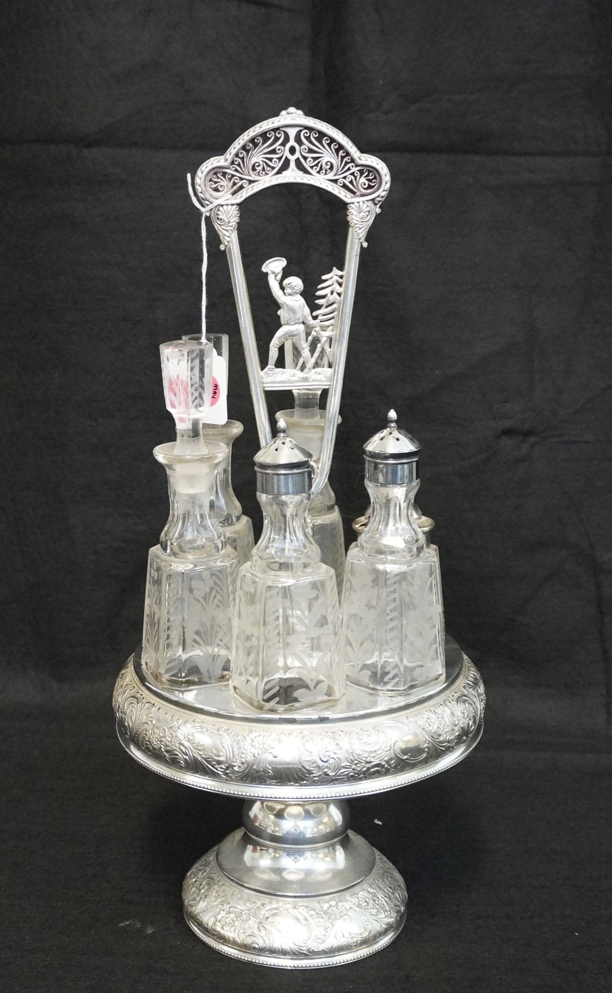 VINTAGE MERIDEN SILVER PLATE CRUET SET: Vintage Meriden Silver Plate Cruet Set with Etched Glass Pieces. Measures approx. 18" x 7.5" and weighs 5 lbs 15 oz.