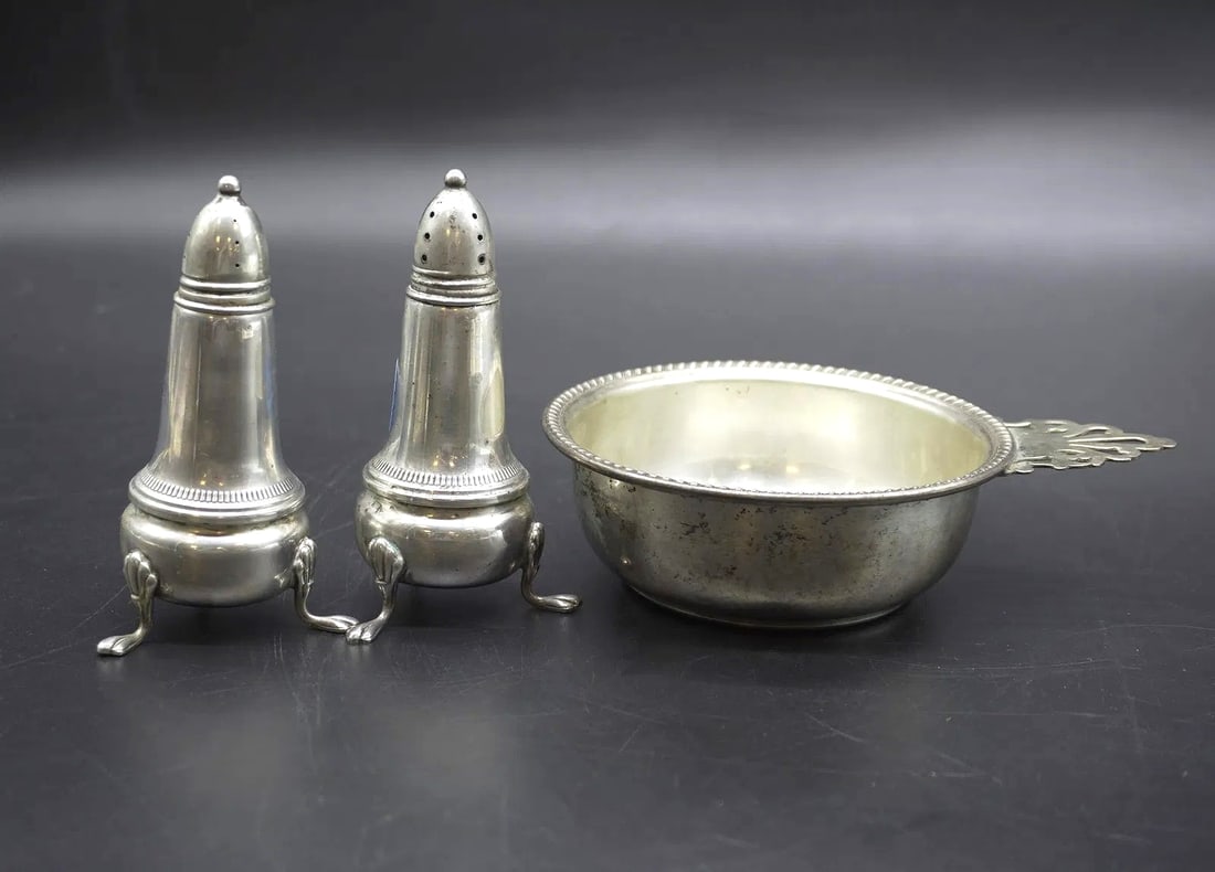 3 PC STERLING SILVER PORRINGER & SALT + PEPPER: 1- Reed & Barton Sterling Silver Porringer 6.25". Approx weight 100 grams. Crown Glass Lined Footed Salt & Pepper Shakers 4.5". Weight 8.4 oz.
