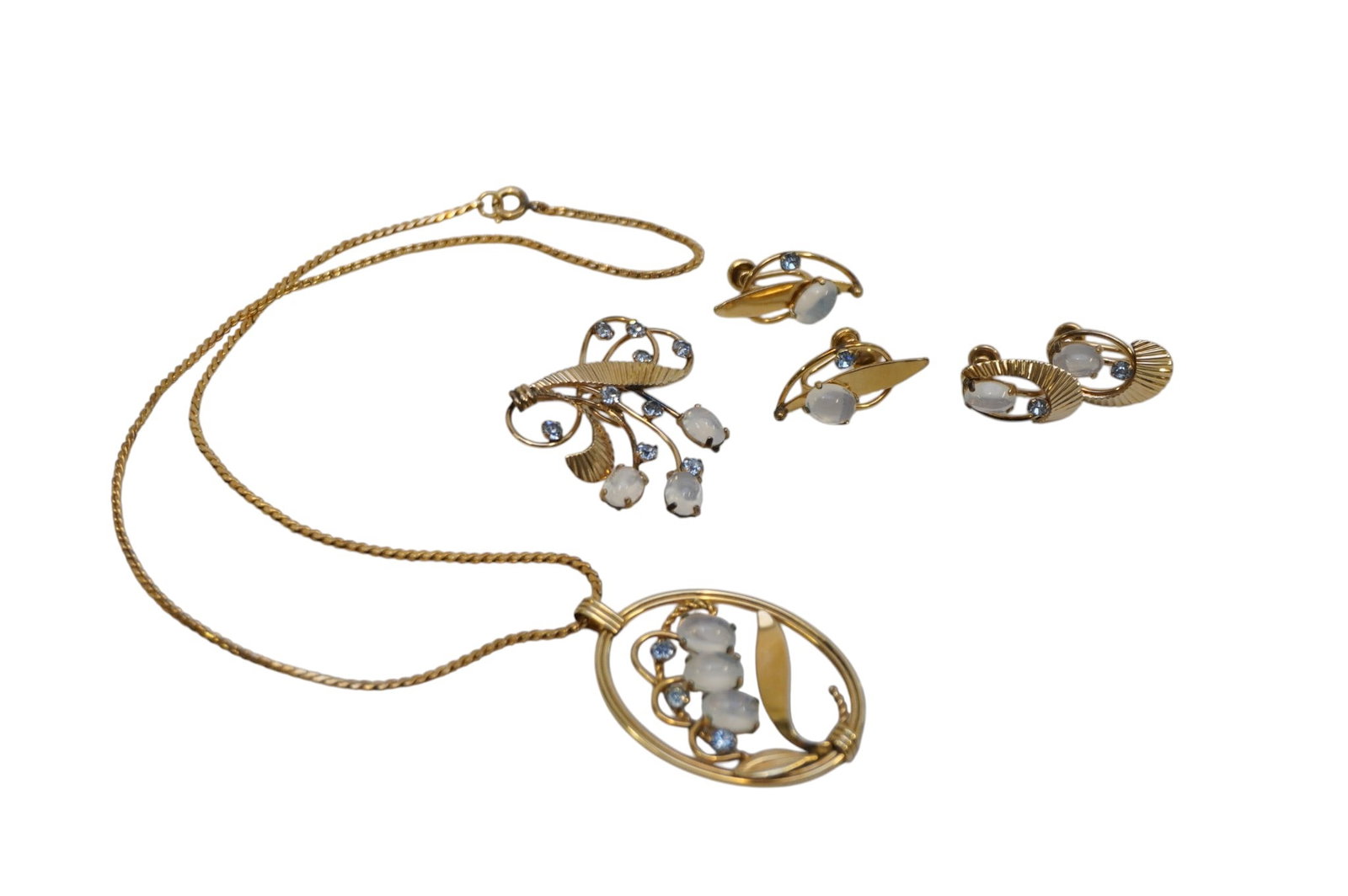 6 PIECES SIGNED VINTAGE VAN DELL MOONSTONE JEWELRY: 6 pieces of Signed Vintage Van Dell Moonstone Jewelry. 12k gold filled. 2 pairs of screw back earrings, one pendant, and one necklace with pendant which is largest and measures approx. 9.25" x 1.25" a