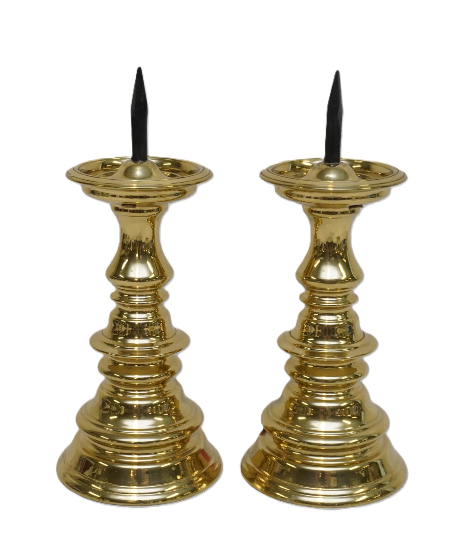 PAIR OF WILLIAMSBURG RESTORATION BRASS CANDLESTICKS: Pair of Williamsburg Restoration Brass Candlesticks. Each measure approx. 10" x 4" in dia. Total lot weight is 5 lbs 8 oz. **In house shipping available on this lot** If you win this lot, please
