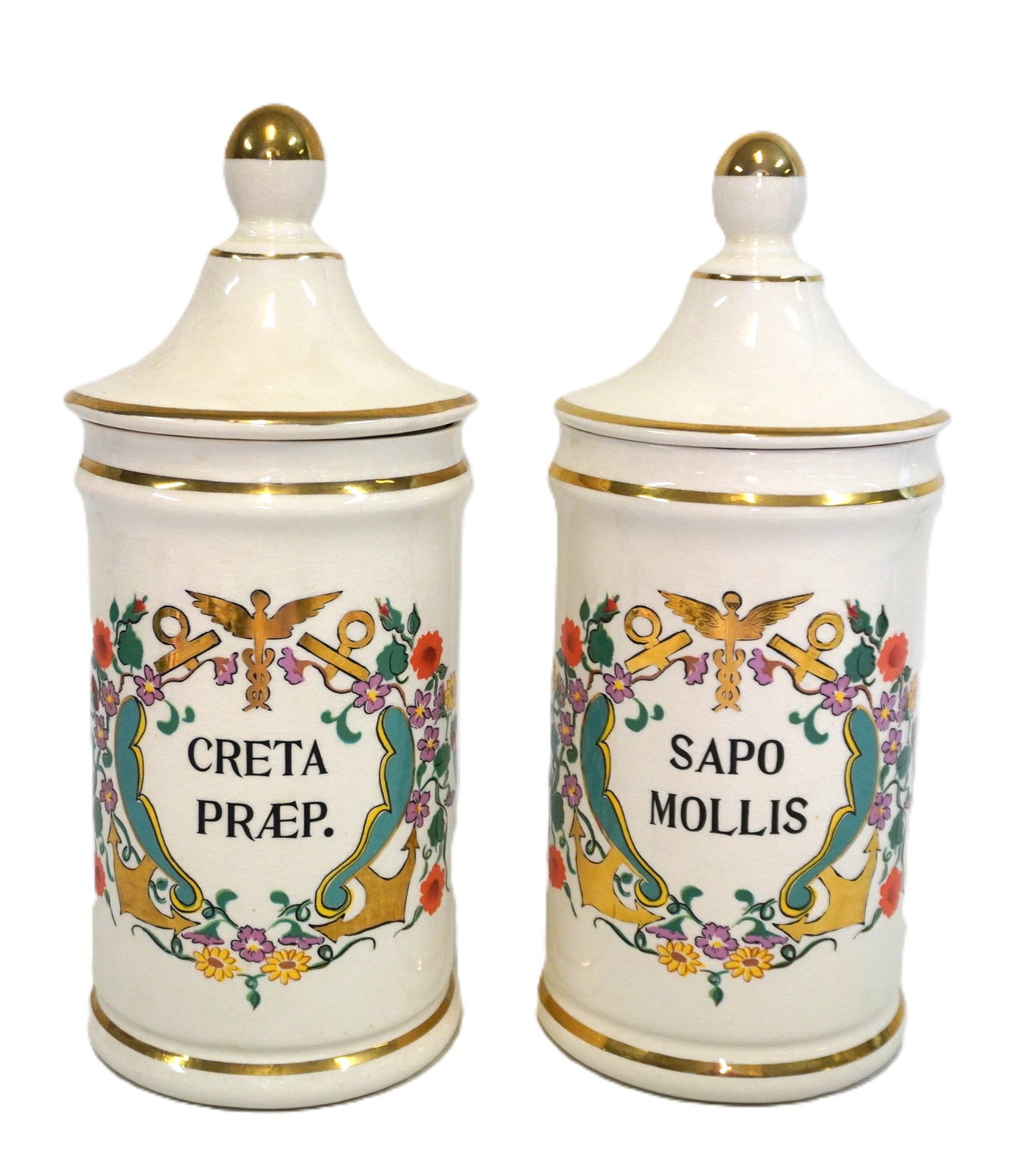 PAIR OF VINTAGE JEANNE ROBINETTE APOTHECARY JARS: Pair of Vintage Jeanne Robinette Apothecary Jars. Each measures approx. 12" x 4.75" in dia. Total lot weight is 3 lbs 8 oz. **In house shipping available on this lot** If you win this lot, please