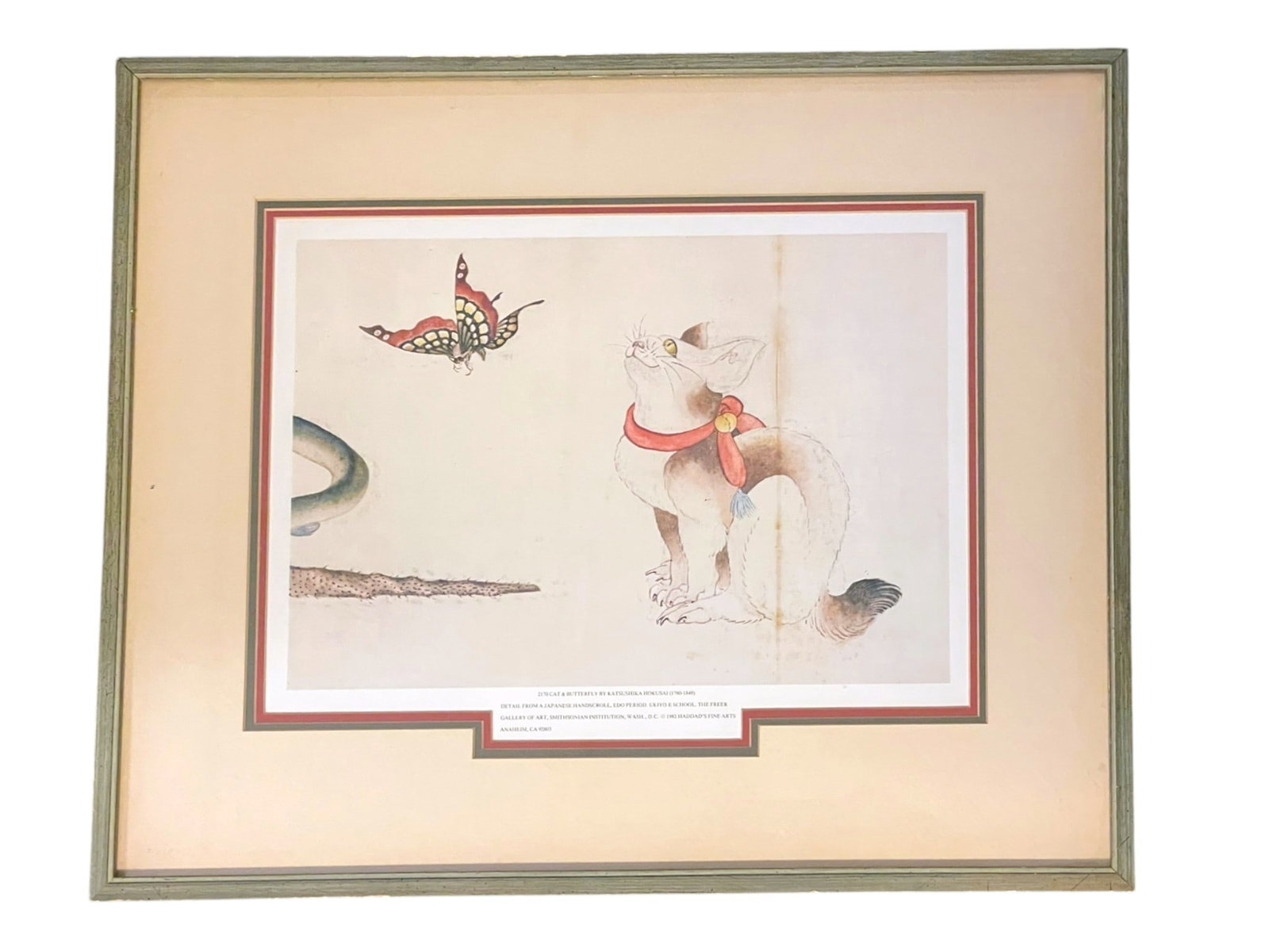 CAT AND BUTTERFLY BY KATSUSHIKA HOKUSAI FRAMED PRINT: Cat and Butterfly by Katsushika Hokusai Framed Print. Measures approx. 22" x 18.5" and weighs 4 lbs 10 oz. **In house shipping available on this lot** If you win this lot, please select self arranged