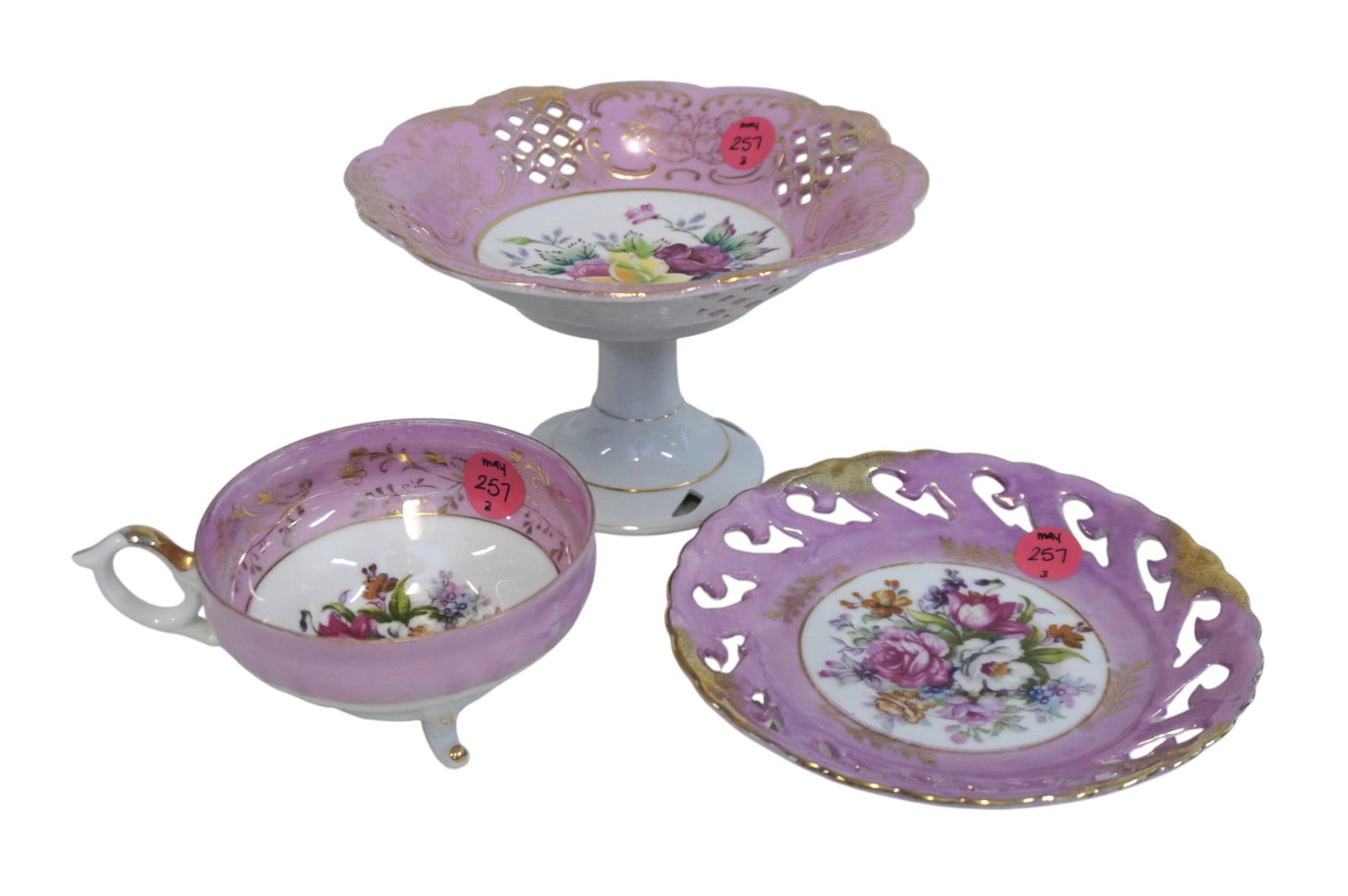 3 PIECES OF PINK AND GOLD GILT FLORAL PORCELAIN: 3 Pieces of Pink and Gold Gilt Floral Porcelain. Largest is pedestal dish which measures approx. 4" x 7" in dia. total lot weight is 1 lb 5 oz. **In house shipping available on this lot** If you win t