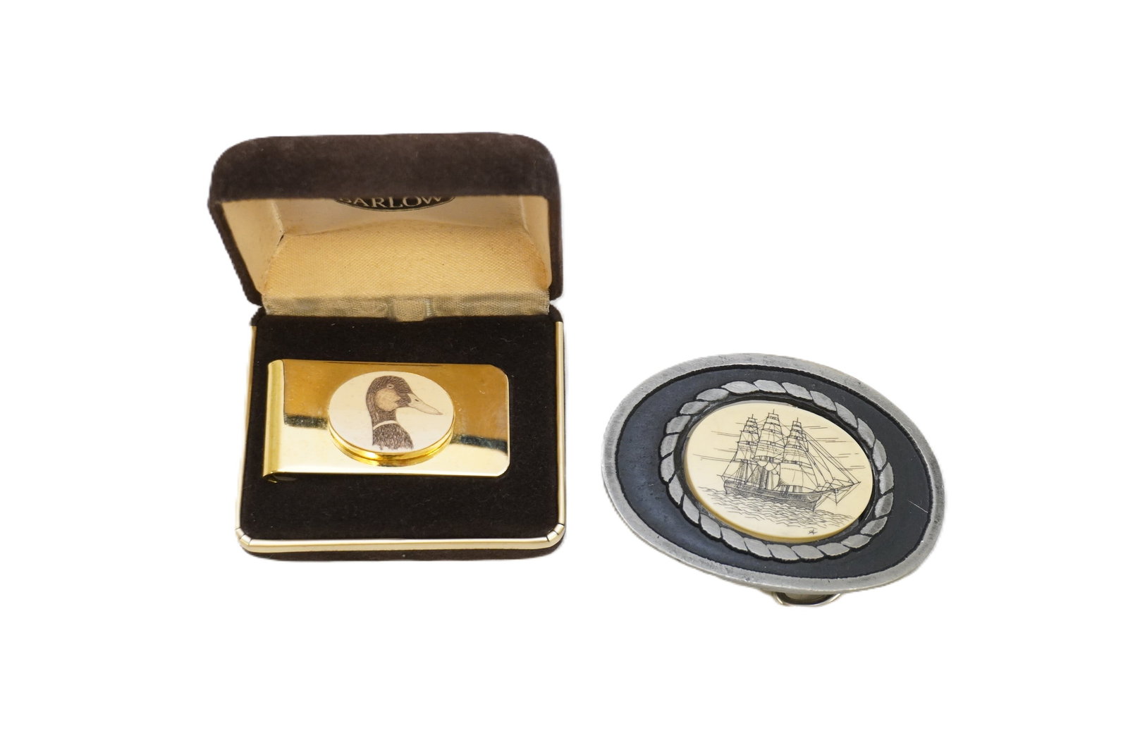 VINTAGE SCRIMSHAW BRASS MONEY CLIP AND PEWTER BELT BUCKLE: Vintage Scrimshaw Barlow Brass Money Clip and Solid Pewter Made in Nantucket Scrimshaw Belt Buckle. Total lot weight is approx. 5.2 oz. and largest is belt buckle which is 3" x 2". **In house shipping