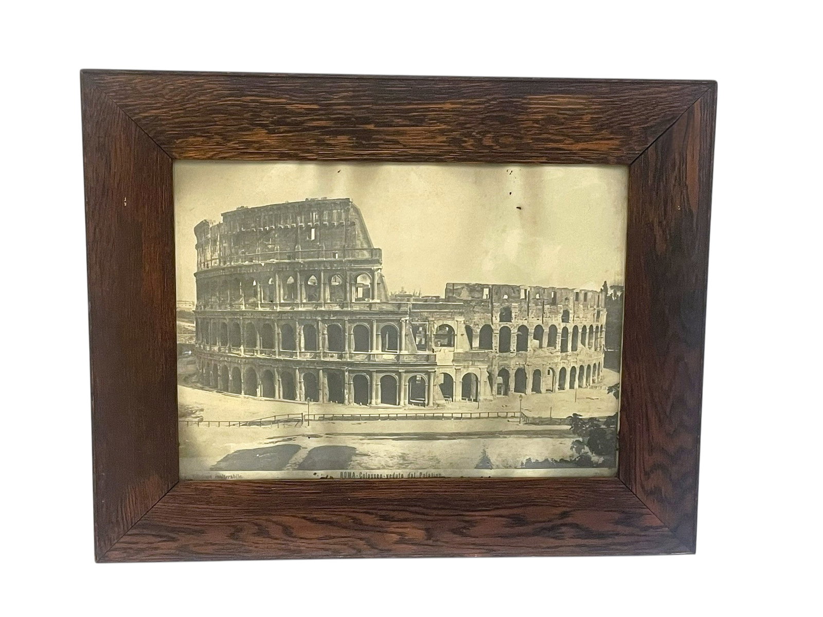 LARGE 19TH C PHOTOGRAPH OF THE COLOSSEUM ROME FRAMED: Large 19th c Print of a Albumen Photograph depicting the Roman Colosseum from the Palatine Hill. In antique oak frame with original glass. In frame measures 23 1/2"x29 1/2"x1". Weight 11 lbs. **In hou