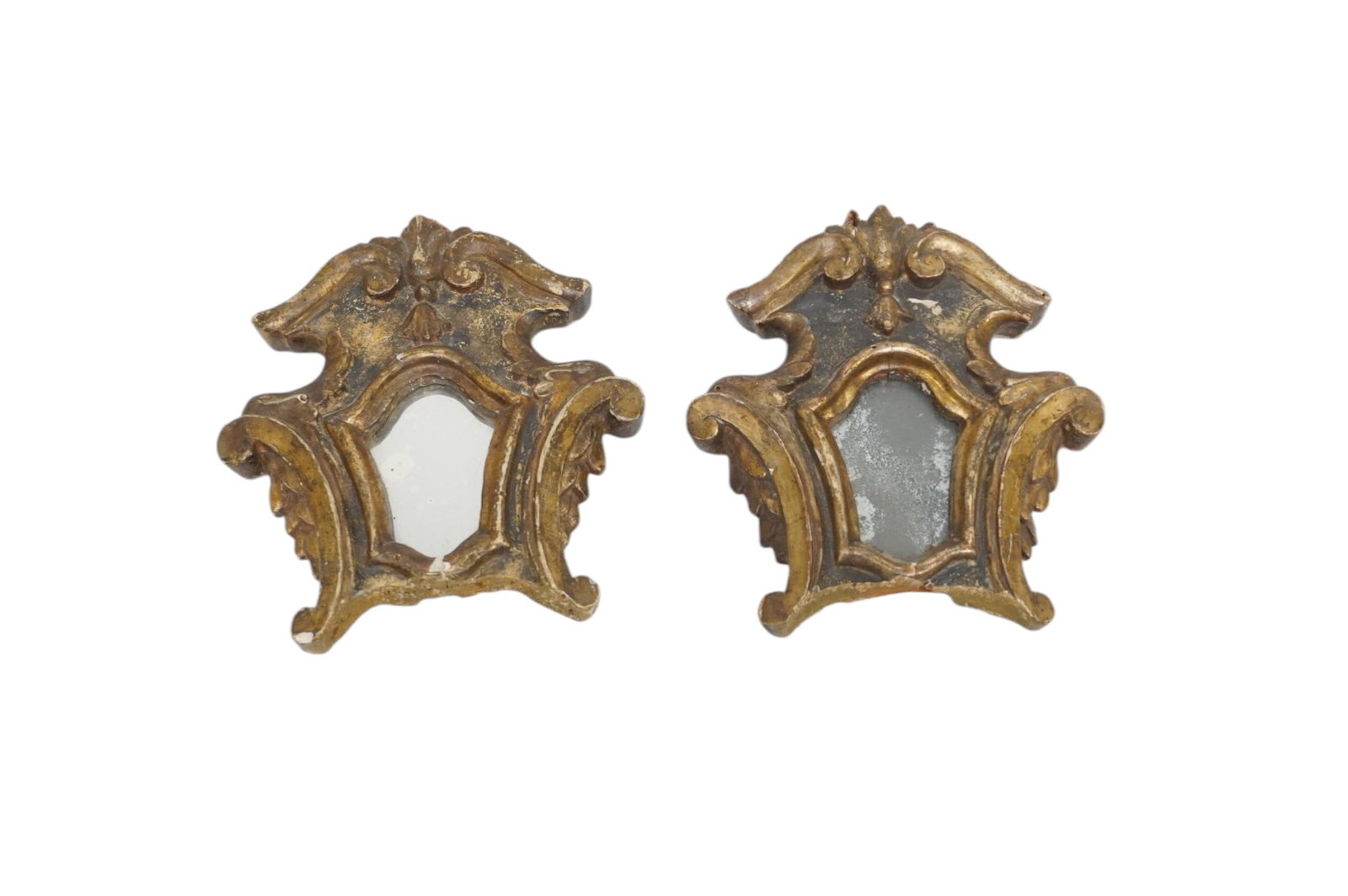 MATCHED PAIR ANTIQUE CARVED GILT WOOD SMALL ACCENT MIRRORS: Pair of two small carved gilt wood accent mirrors. Each 5"x6". Weight 6 oz. . PROVENANCE The Historic R.M. Venning House, Charleston SC **In house shipping available on this lot** If you win this lot,