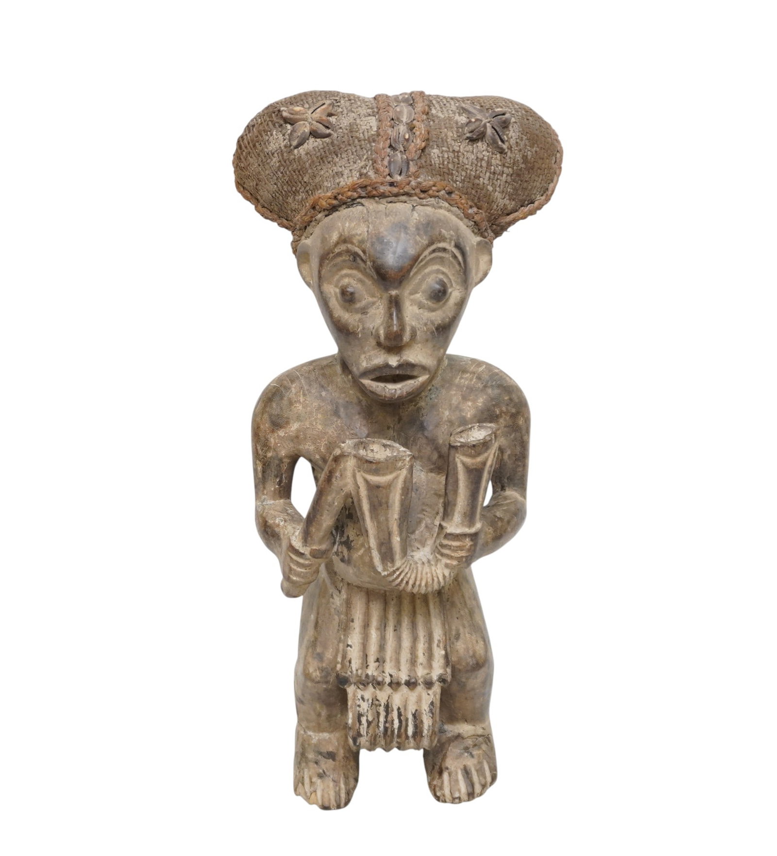 1930s CENTRAL AFRICA CARVED TRIBAL CHIEF WITH COWRIE SHELL: Central Africa Hand Carved Tribal Chief with Ornate Cowrie Shell Headdress c. 1930s. Measures 8 1/2"x7 1/2"x20 1/2" Tall. Weight 7 lbs **In house shipping available on this lot** If you win this lot, 