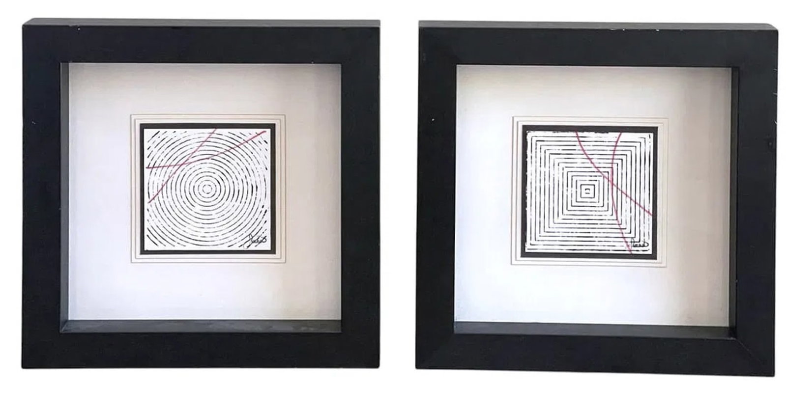 PAIR ABSTRACT BLACK & RED PRINTS KINDER - HARRIS: Pair of Framed Geometric Abstract Prints in Black and White, disrupted by a red line from Kinder Harris Design. In matching deep black frames under glass. Each measures approx. 19.5" x 19" x 2.5" and
