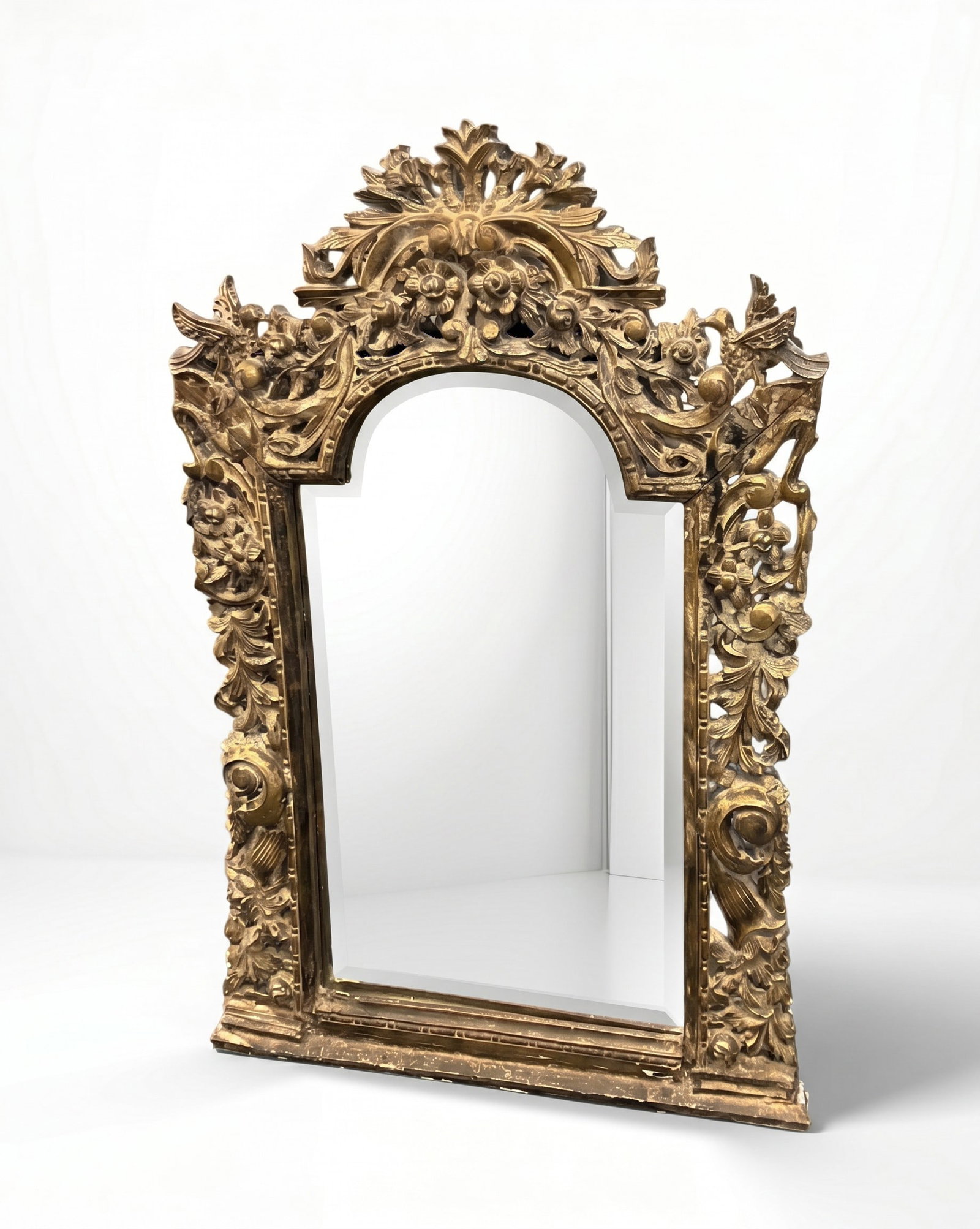 ANTIQUE SPANISH BAROQUE GILT CARVED WOOD MIRROR: Antique Spanish Baroque Gilt Carved Wood Frame with Birds. Measures 41" x 27" x 2". Weighs approx 18 lbs. **In house shipping available on this lot** If you win this lot, please select self arranged f