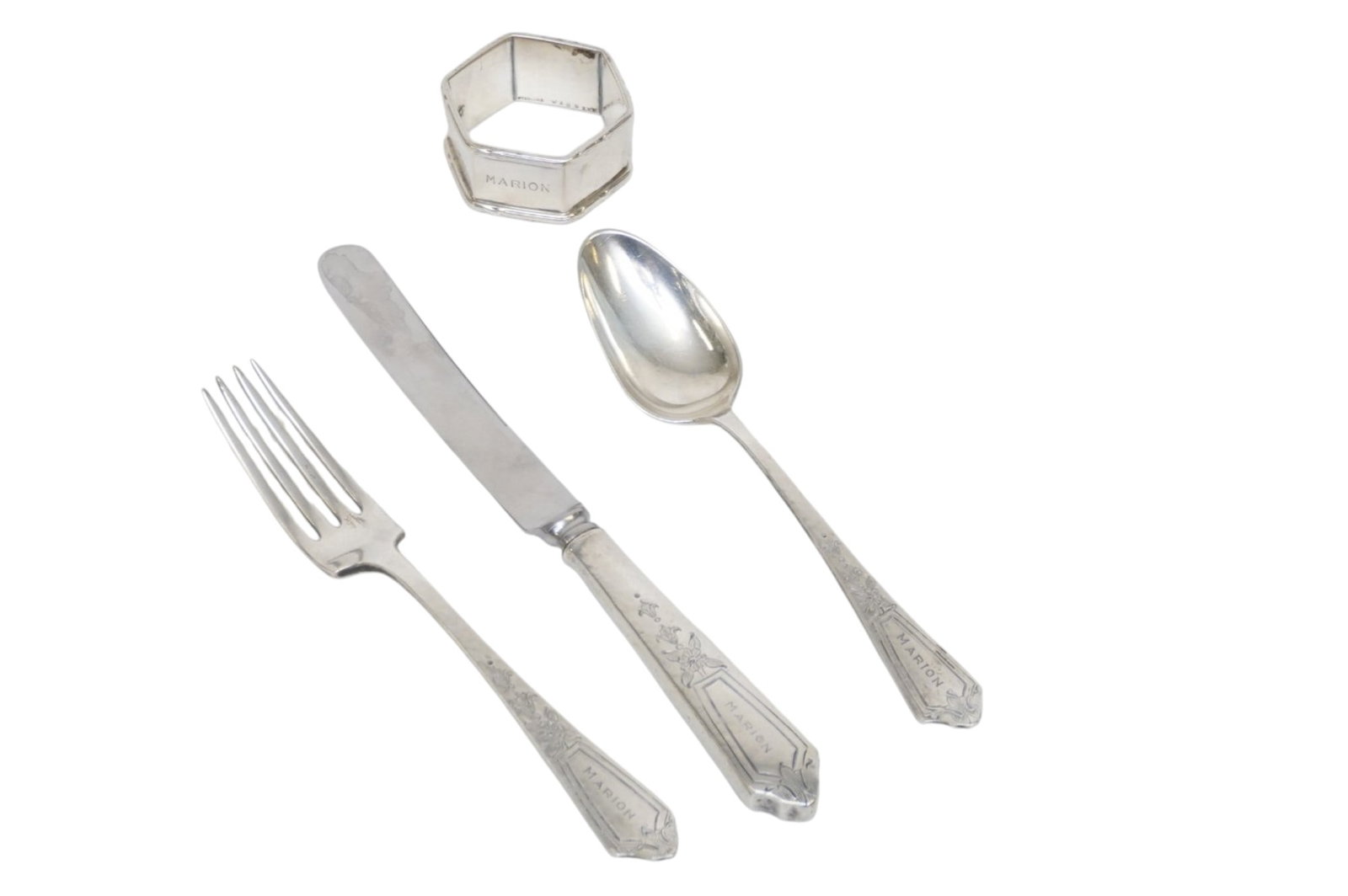 4 pc GORHAM STERLING 1912 YOUTH SET: 4 Piece 1912 Pattern A Gorham Sterling Silver Youth Set, Engraved :"Marion".. Set includes Napkin Ring 1 3/4". Fork 6". Spoon 6". Knife with Stainless Blade 7 1/2". Approximate silver weight without k