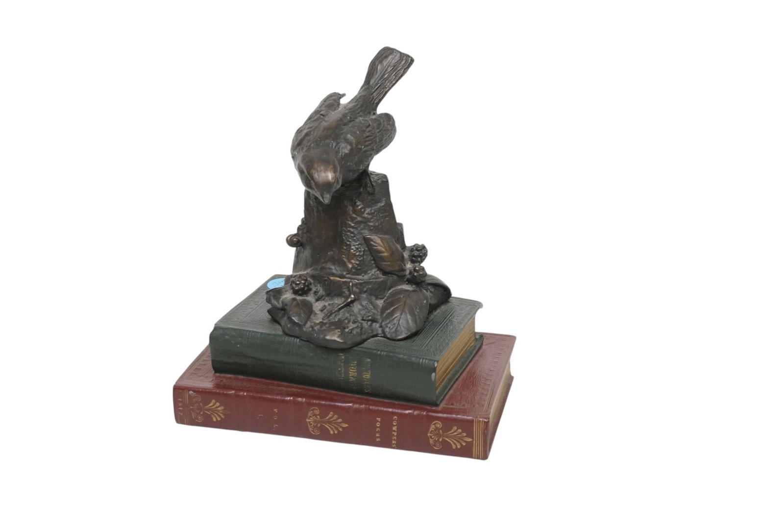 20th c SCULPTURE BIRD ON BOOKS: Composite Bronzed Sculpture Bird on Books. Measures 6 1/2"x4"x 7 1/4". Weight 2 lbs 11 oz. .PROVENANCE The Historic R.M. Venning House, Charleston SC **In house shipping available on this lot** If you