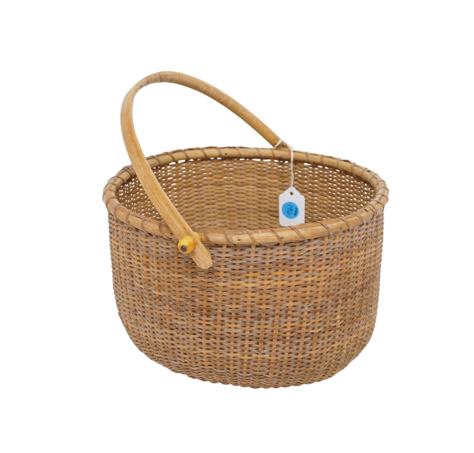 1993 INLAID PENNY NANTUCKET BASKET: Vintage Nantucket Basket with Inlaid Penny on Interior dated 1993. Measures approx. 11.5" x 10" x 12" (bottom to handle) and weighs 9.6 oz