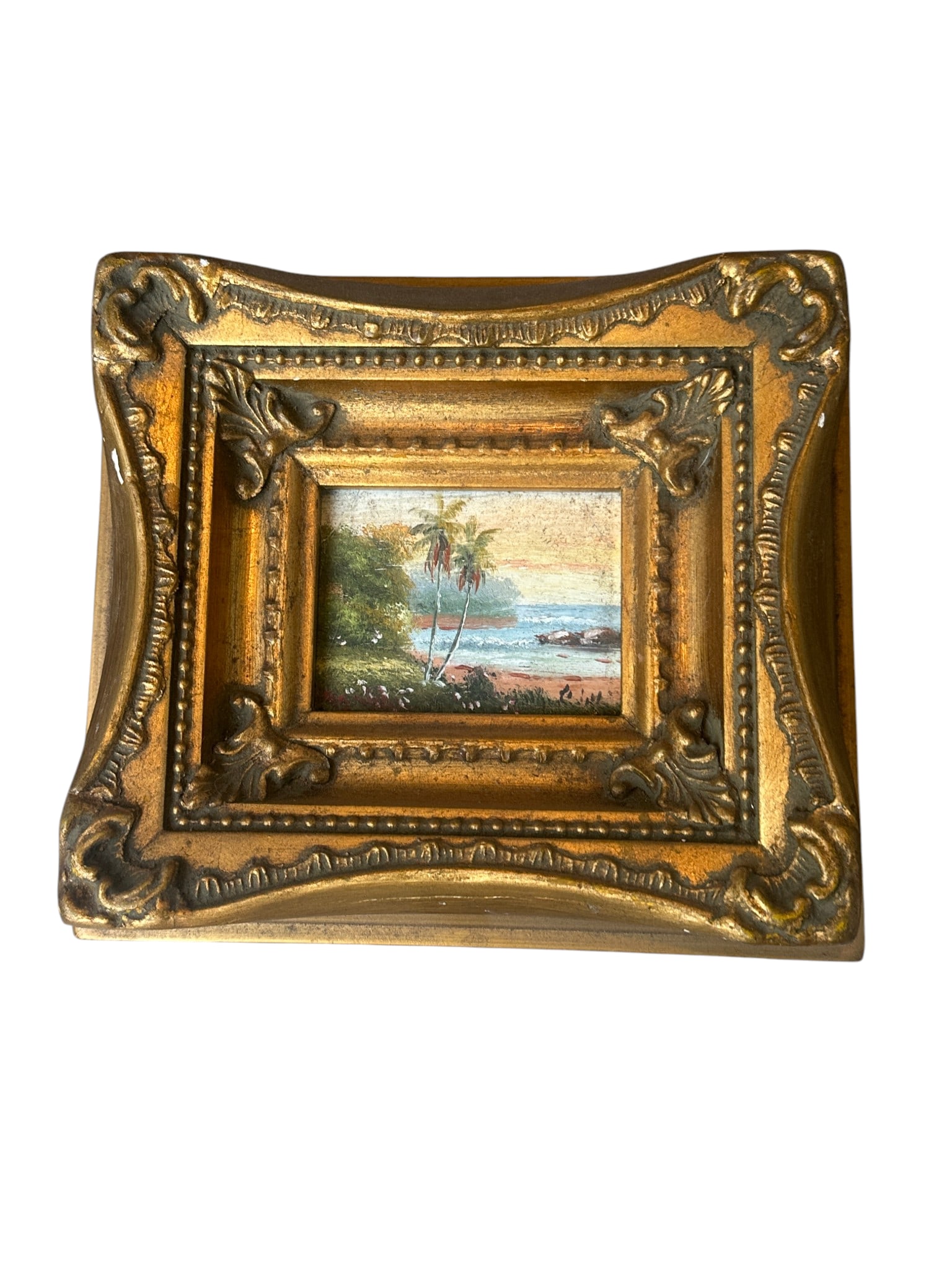 MINIATURE GILT FRAMED ORIGINAL OIL ON BOARD TROPICAL LANDSCAPE: Measures approximately 7" x 7.5"x 2". Weighs approximately 1 pound. **In house shipping available on this lot** If you win this lot, please select self arranged for in house shipping when paying**