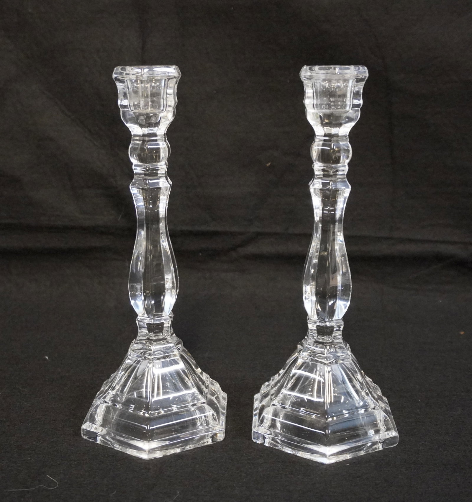 TIFFANY & CO. PAIR OF "HAMPTON" CRYSTAL CANDLESTICKS: Pair of Tiffany & Co. Hampton Crystal Candlesticks. Each measures approx. 9.25" x 4" in dia.