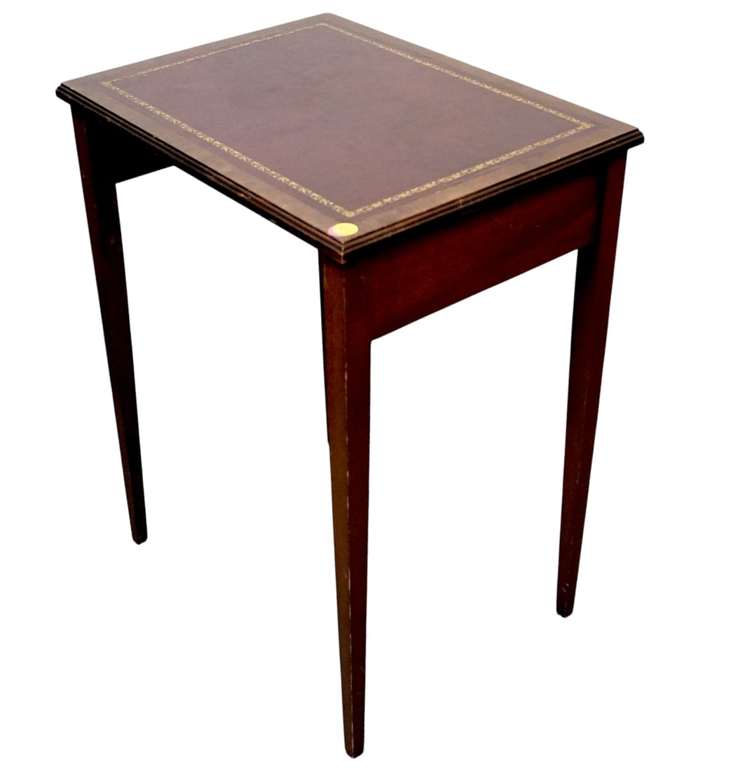 VINTAGE MAHOGANY SIDE TABLE WITH TOOLED LEATHER TOP: Vintage 1940s Mahogany Side Table with Tooled Leather Top. Measures 18"x14"x24" tall.**In house shipping available on this lot** If you win this lot, please select self arranged for in house shipping 