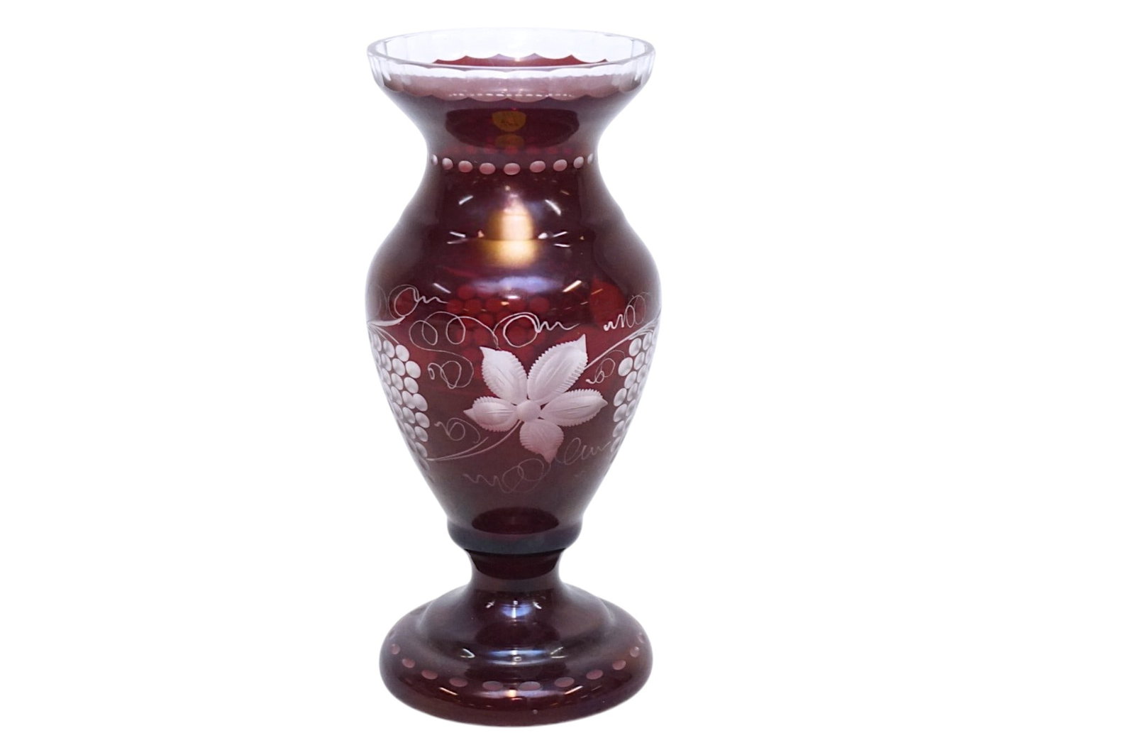 EGERMANN BOHEMIAN RUBY CUT TO CLEAR VASE: Vintage Egermann Bohemian Ruby Red cut to Clear Vase featuring a etched grape and vine pattern. Vase measures 3 1/2"x3 1/2:x8 1/4". Weight 15 oz. **In house shipping available on this lot** If you win